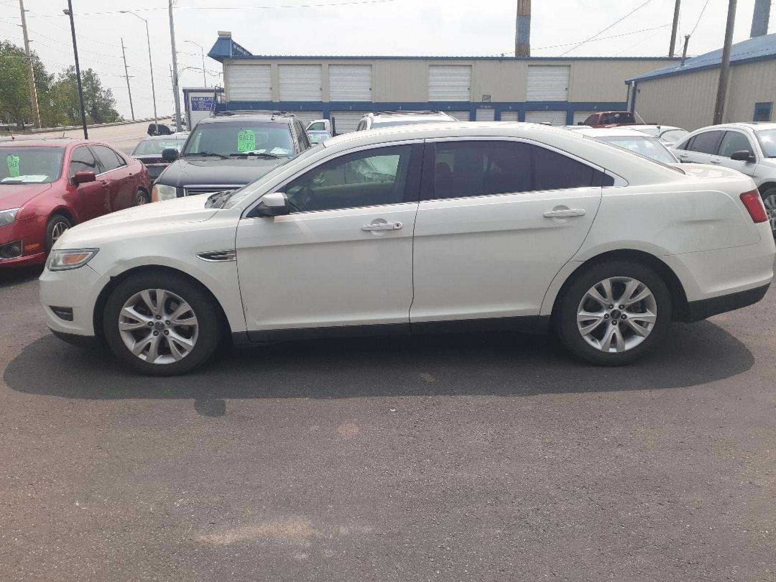 2010 Ford Taurus (1FAHP2EW1AG) with an 3.5L V6 DOHC 24V engine, 6-Speed Automatic transmission, located at 2015 Cambell Street, Rapid City, SD, 57701, (605) 342-8326, 44.066433, -103.191772 - CARFAX AVAILABLE - Photo #0