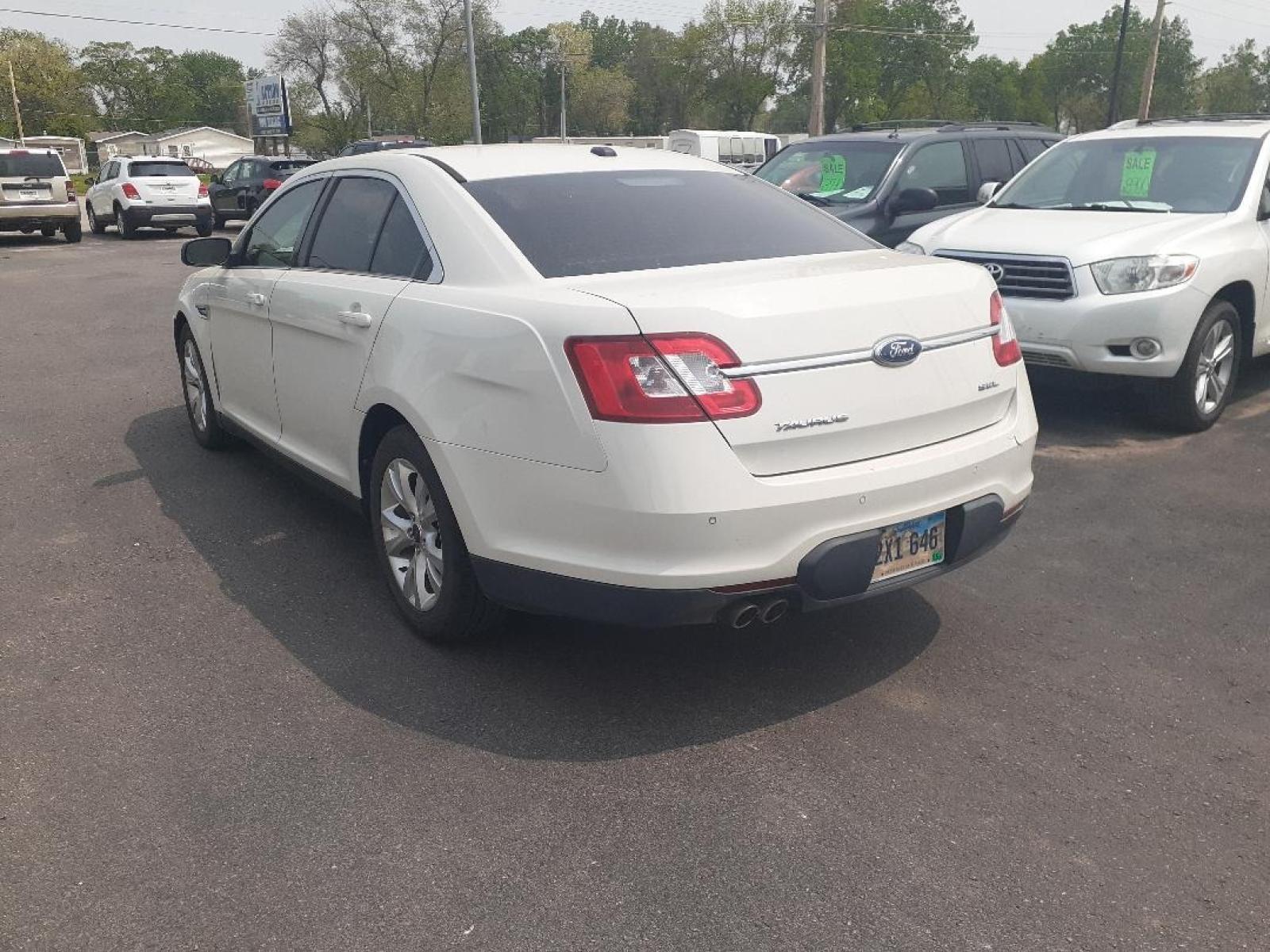 2010 Ford Taurus (1FAHP2EW1AG) with an 3.5L V6 DOHC 24V engine, 6-Speed Automatic transmission, located at 2015 Cambell Street, Rapid City, SD, 57701, (605) 342-8326, 44.066433, -103.191772 - CARFAX AVAILABLE - Photo #2