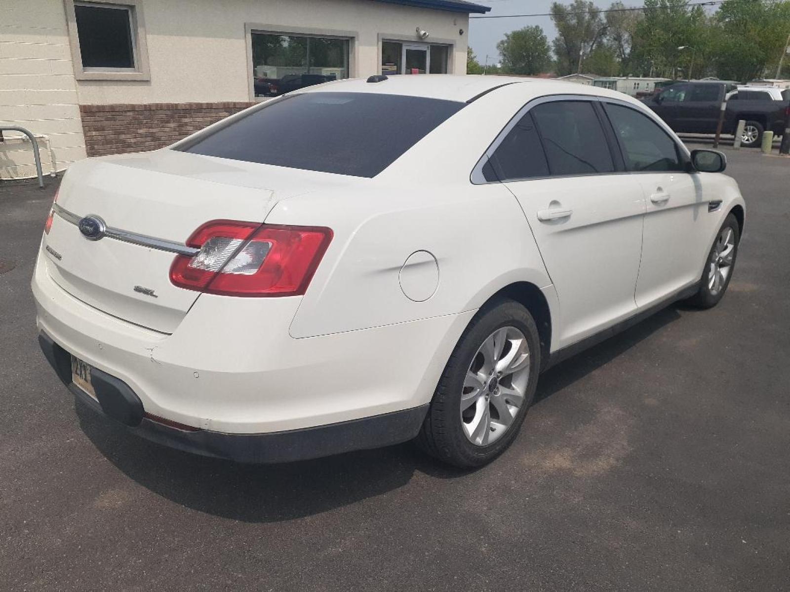 2010 Ford Taurus (1FAHP2EW1AG) with an 3.5L V6 DOHC 24V engine, 6-Speed Automatic transmission, located at 2015 Cambell Street, Rapid City, SD, 57701, (605) 342-8326, 44.066433, -103.191772 - CARFAX AVAILABLE - Photo #3