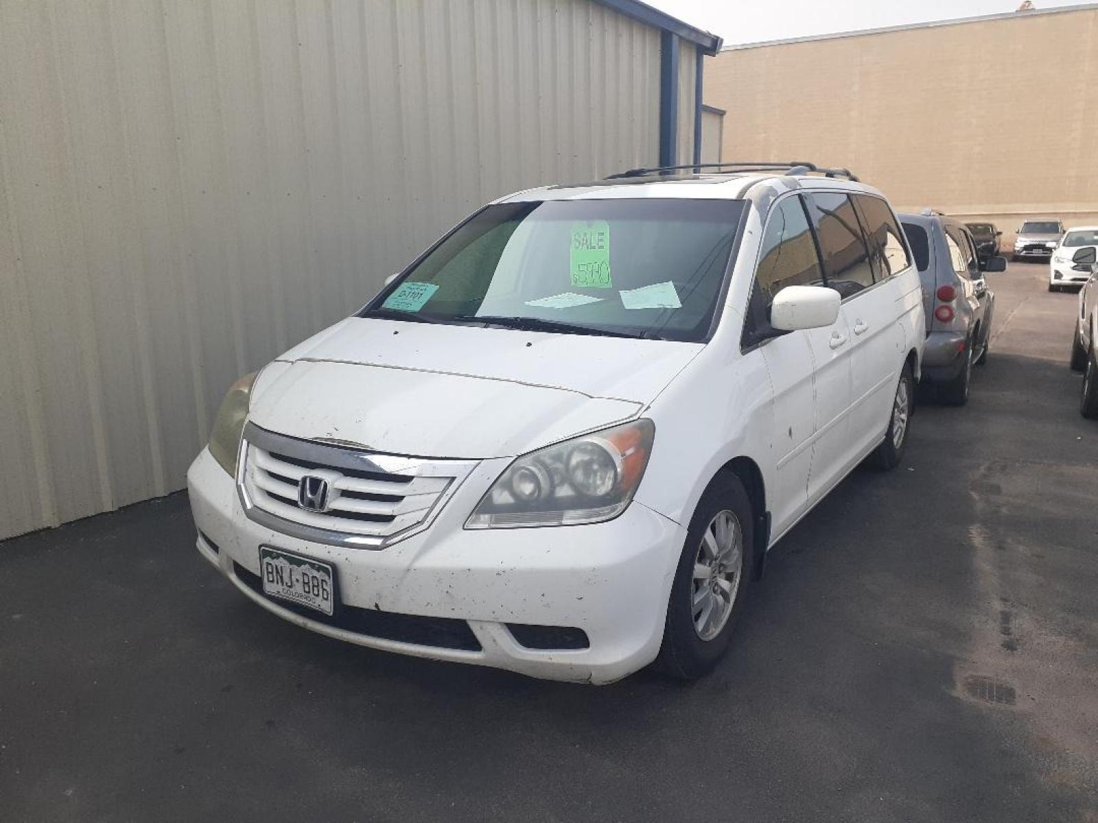 2009 Honda Odyssey EX-L (5FNRL38649B) with an 3.5L V6 SOHC 24V engine, 5-Speed Automatic transmission, located at 2015 Cambell Street, Rapid City, SD, 57701, (605) 342-8326, 44.066433, -103.191772 - CARFAX AVAILABLE - Photo #2