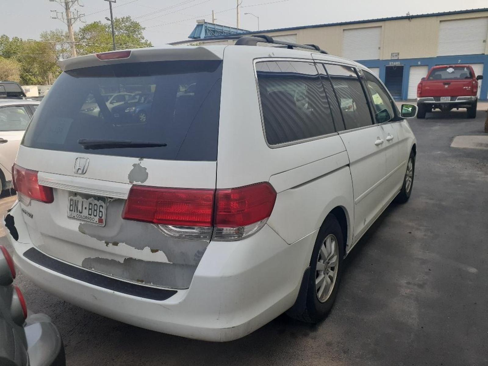 2009 Honda Odyssey EX-L (5FNRL38649B) with an 3.5L V6 SOHC 24V engine, 5-Speed Automatic transmission, located at 2015 Cambell Street, Rapid City, SD, 57701, (605) 342-8326, 44.066433, -103.191772 - CARFAX AVAILABLE - Photo #5