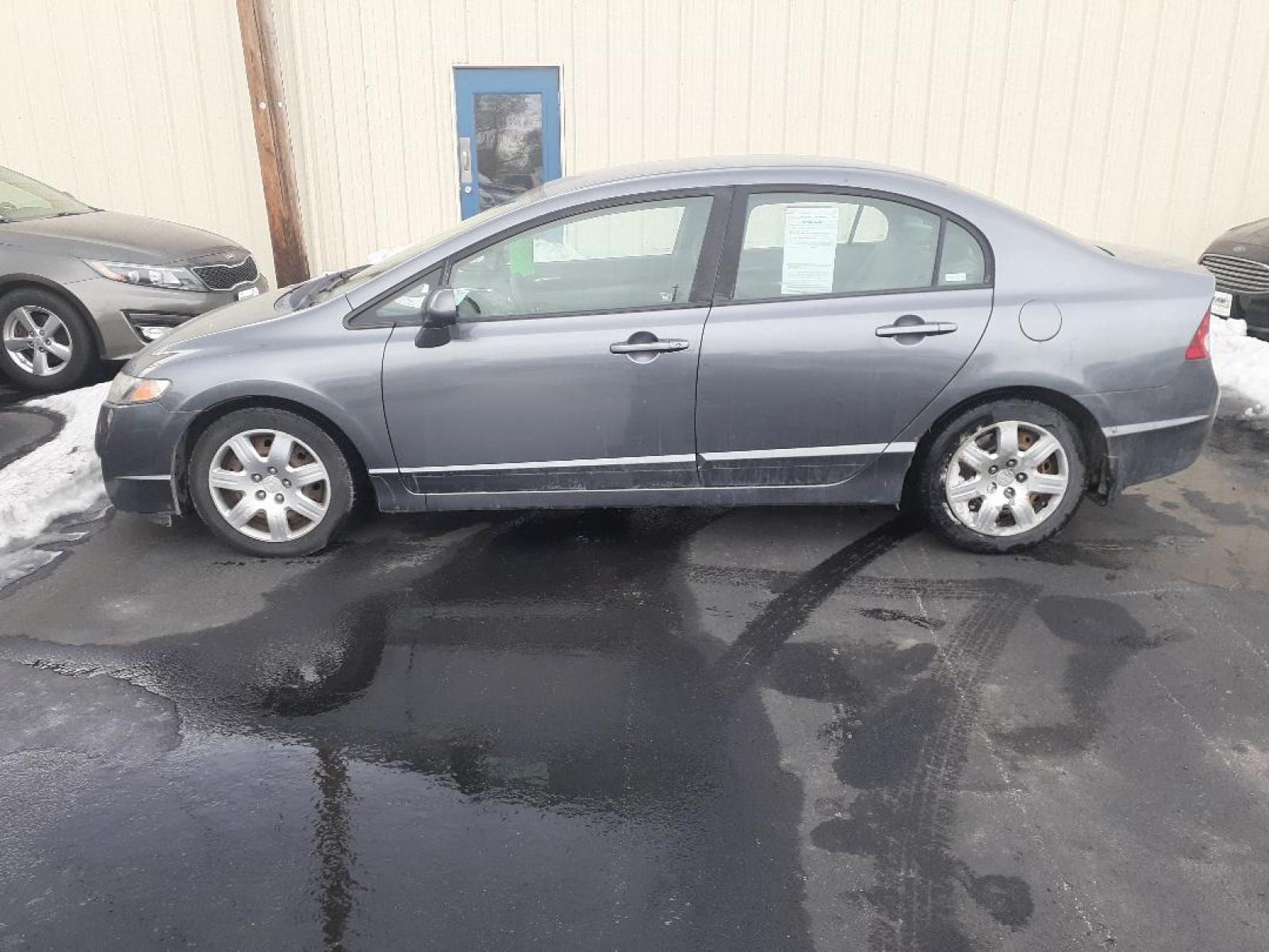 2009 Honda Civic LX Sedan 5-Speed AT (19XFA16599E) with an 1.8L L4 SOHC 16V engine, 5-Speed Automatic Overdrive transmission, located at 2015 Cambell Street, Rapid City, SD, 57701, (605) 342-8326, 44.066433, -103.191772 - CARFAX AVAILABLE - Photo #0
