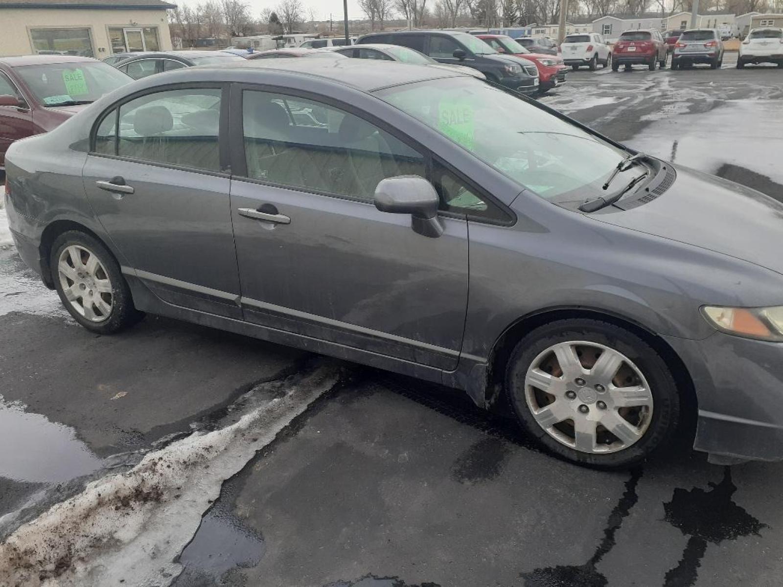 2009 Honda Civic LX Sedan 5-Speed AT (19XFA16599E) with an 1.8L L4 SOHC 16V engine, 5-Speed Automatic Overdrive transmission, located at 2015 Cambell Street, Rapid City, SD, 57701, (605) 342-8326, 44.066433, -103.191772 - CARFAX AVAILABLE - Photo #1