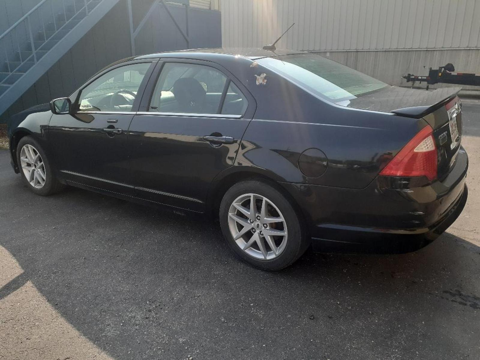 2012 Ford Fusion SEL (3FAHP0JA4CR) with an 2.5L L4 DOHC 16V engine, located at 2015 Cambell Street, Rapid City, SD, 57701, (605) 342-8326, 44.066433, -103.191772 - CARFAX AVAILABLE - Photo #3