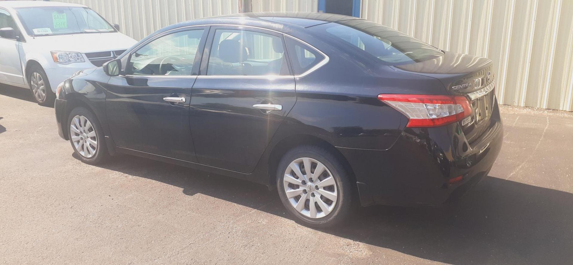 2015 Nissan Sentra S 6MT (3N1AB7AP1FY) with an 1.8L L4 SFI DOHC 16V engine, 6-Speed Manual transmission, located at 2015 Cambell Street, Rapid City, SD, 57701, (605) 342-8326, 44.066433, -103.191772 - Photo#1