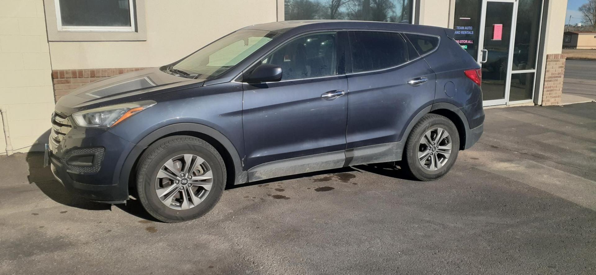 2016 Hyundai Santa Fe Sport 2.4 FWD (5XYZT3LB9GG) with an 2.4L L4 DOHC 16V engine, 6-Speed Automatic transmission, located at 2015 Cambell Street, Rapid City, SD, 57701, (605) 342-8326, 44.066433, -103.191772 - CARFAX AVAILABLE - Photo#1