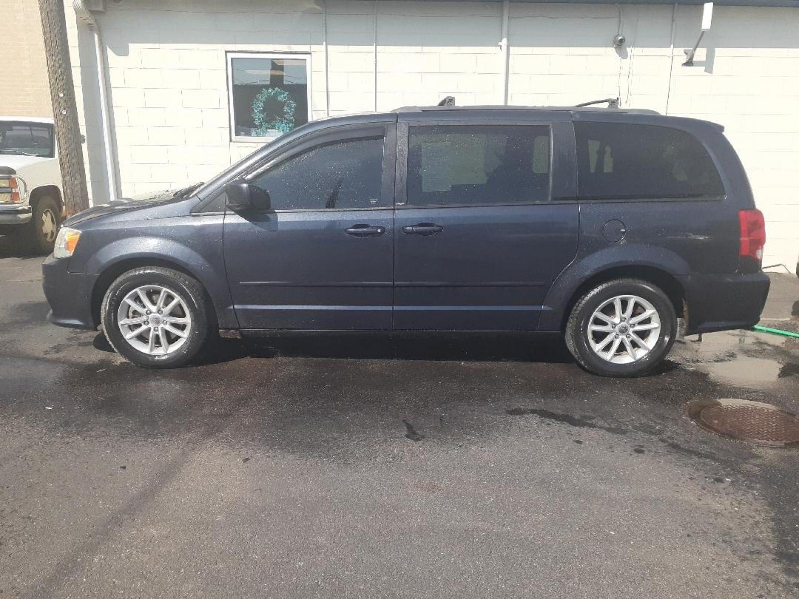 2014 Dodge Grand Caravan SXT (2C4RDGCG5ER) with an 3.6L V6 DOHC 24V engine, 6-Speed Automatic transmission, located at 2015 Cambell Street, Rapid City, SD, 57701, (605) 342-8326, 44.066433, -103.191772 - Photo #0