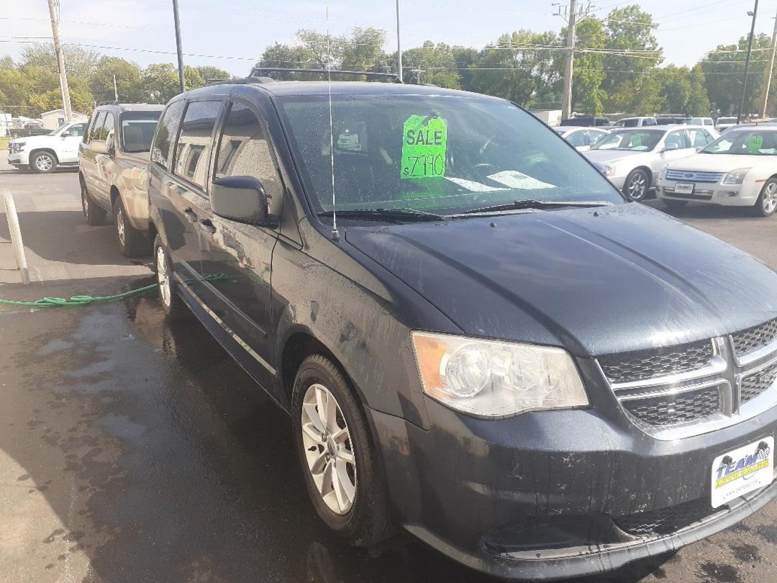 2014 Dodge Grand Caravan SXT (2C4RDGCG5ER) with an 3.6L V6 DOHC 24V engine, 6-Speed Automatic transmission, located at 2015 Cambell Street, Rapid City, SD, 57701, (605) 342-8326, 44.066433, -103.191772 - CARFAX AVAILABLE - Photo #3