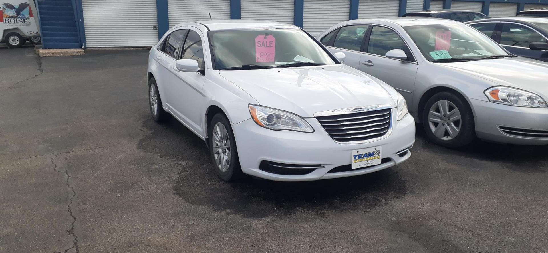 2014 Chrysler 200 LX (1C3CCBAB6EN) with an 2.4L L4 DOHC 16V engine, 6-Speed Automatic transmission, located at 2015 Cambell Street, Rapid City, SD, 57701, (605) 342-8326, 44.066433, -103.191772 - CARFAX AVAILABLE - Photo#1