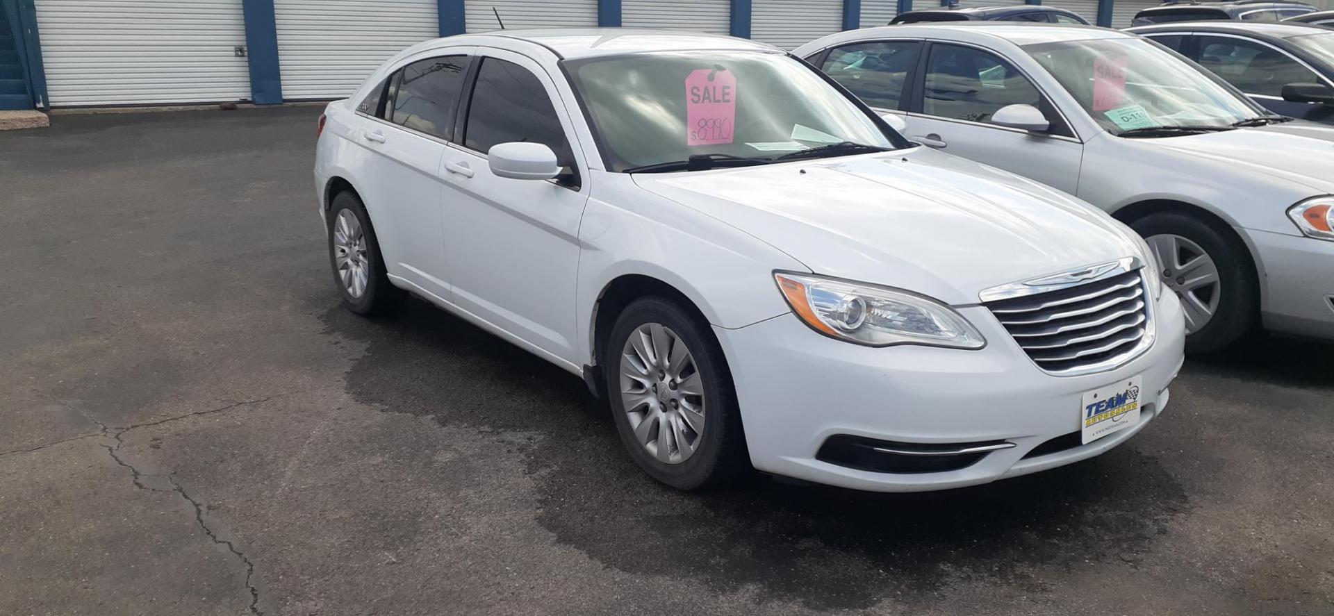 2014 Chrysler 200 LX (1C3CCBAB6EN) with an 2.4L L4 DOHC 16V engine, 6-Speed Automatic transmission, located at 2015 Cambell Street, Rapid City, SD, 57701, (605) 342-8326, 44.066433, -103.191772 - CARFAX AVAILABLE - Photo#2