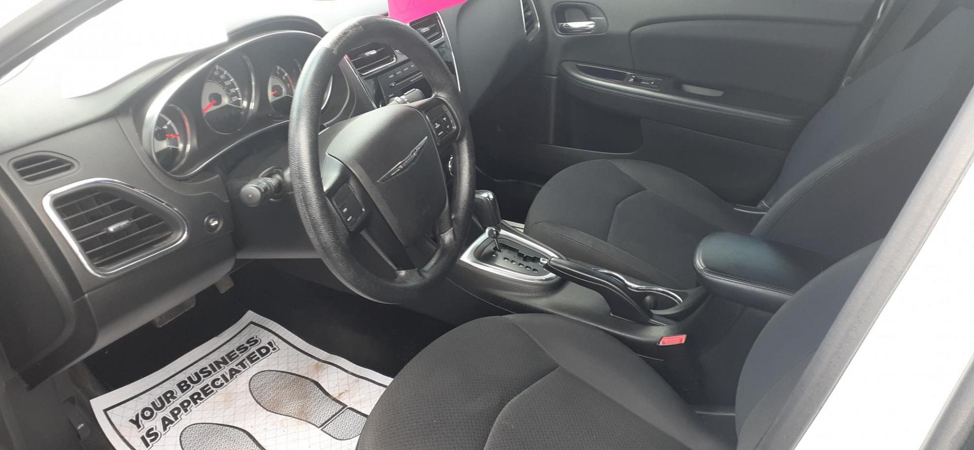 2014 Chrysler 200 LX (1C3CCBAB6EN) with an 2.4L L4 DOHC 16V engine, 6-Speed Automatic transmission, located at 2015 Cambell Street, Rapid City, SD, 57701, (605) 342-8326, 44.066433, -103.191772 - CARFAX AVAILABLE - Photo#6