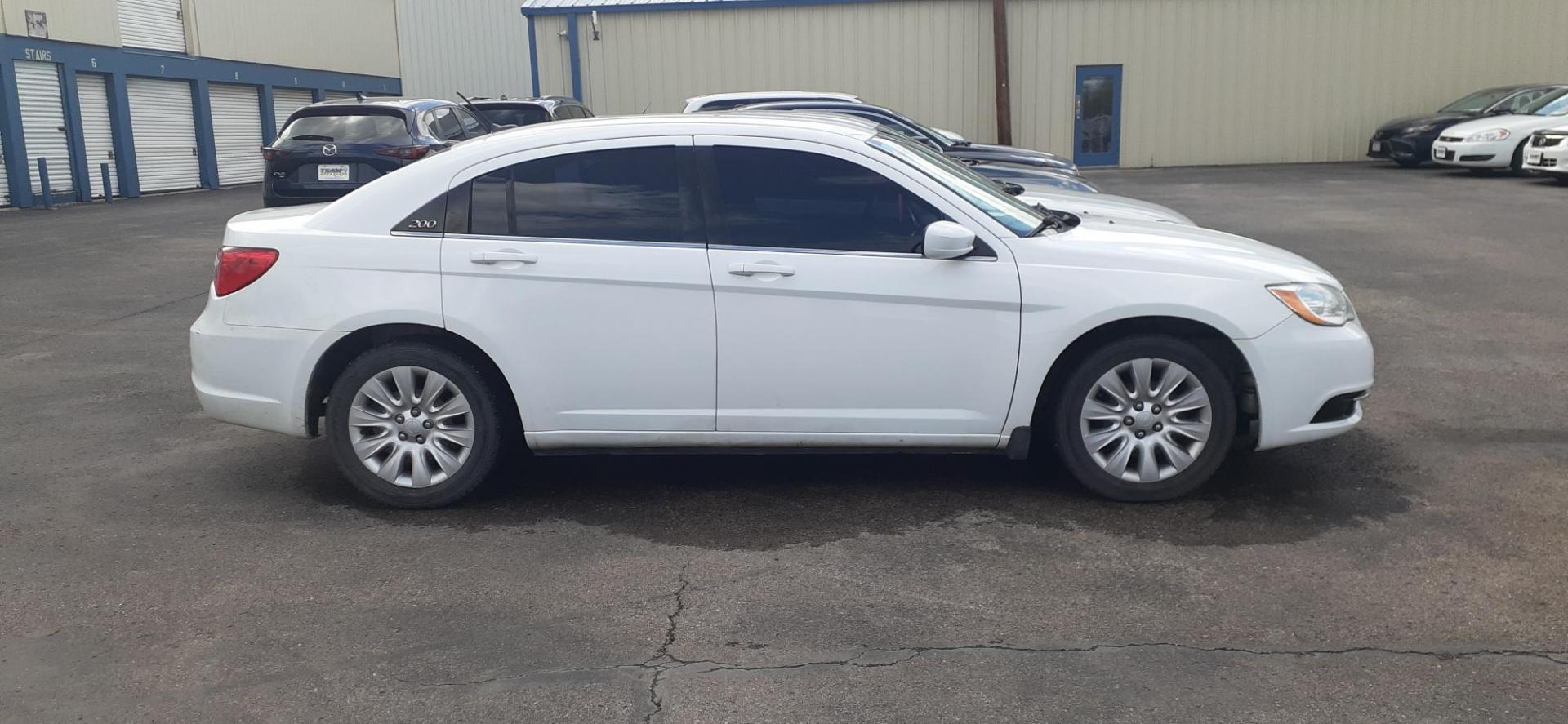 2014 Chrysler 200 LX (1C3CCBAB6EN) with an 2.4L L4 DOHC 16V engine, 6-Speed Automatic transmission, located at 2015 Cambell Street, Rapid City, SD, 57701, (605) 342-8326, 44.066433, -103.191772 - CARFAX AVAILABLE - Photo#3