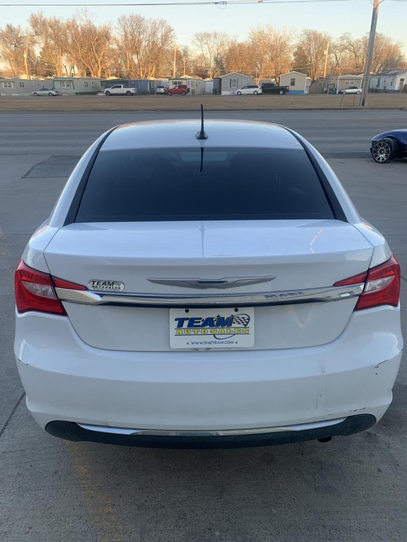 2014 White Chrysler 200 LX (1C3CCBAB6EN) with an 2.4L L4 DOHC 16V engine, 6-Speed Automatic transmission, located at 2015 Cambell Street, Rapid City, SD, 57701, (605) 342-8326, 44.066433, -103.191772 - CARFAX AVAILABLE - Photo#2