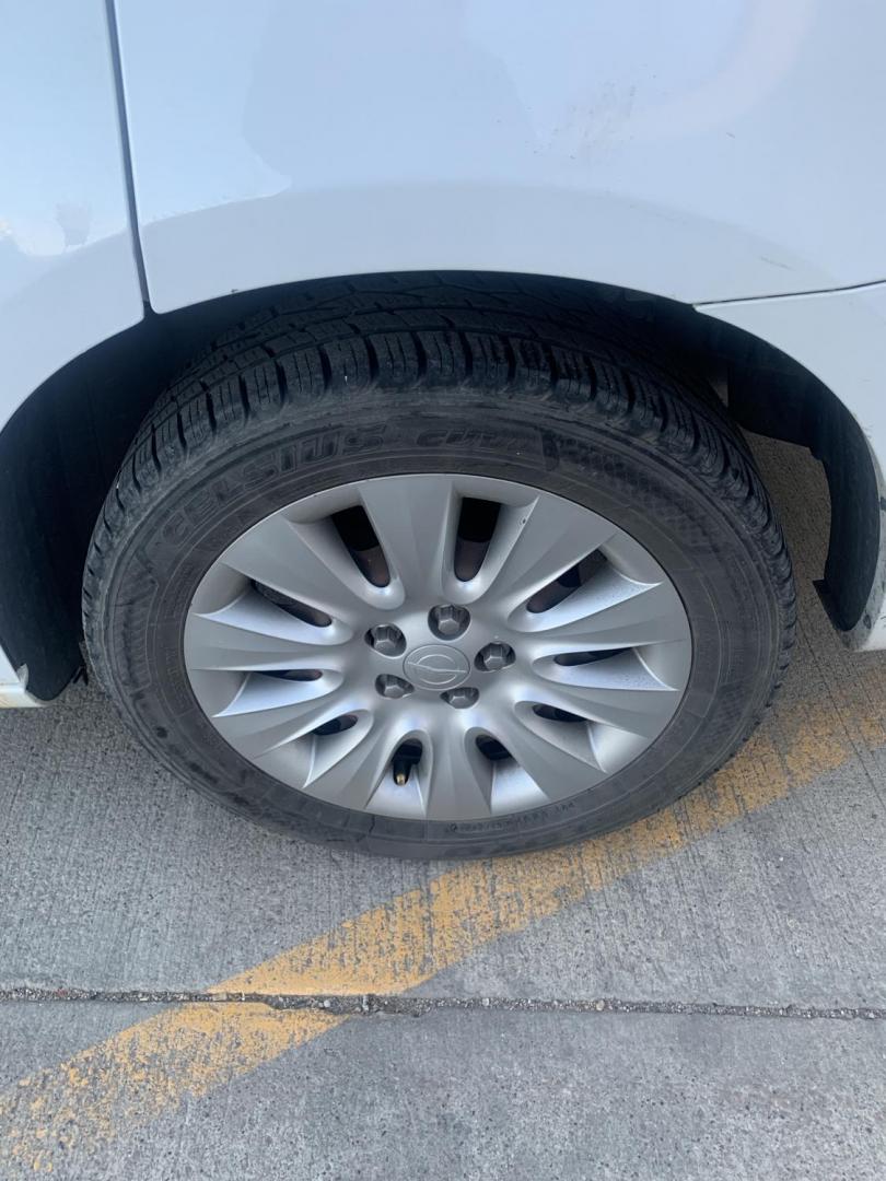 2014 White Chrysler 200 LX (1C3CCBAB6EN) with an 2.4L L4 DOHC 16V engine, 6-Speed Automatic transmission, located at 2015 Cambell Street, Rapid City, SD, 57701, (605) 342-8326, 44.066433, -103.191772 - CARFAX AVAILABLE - Photo#6