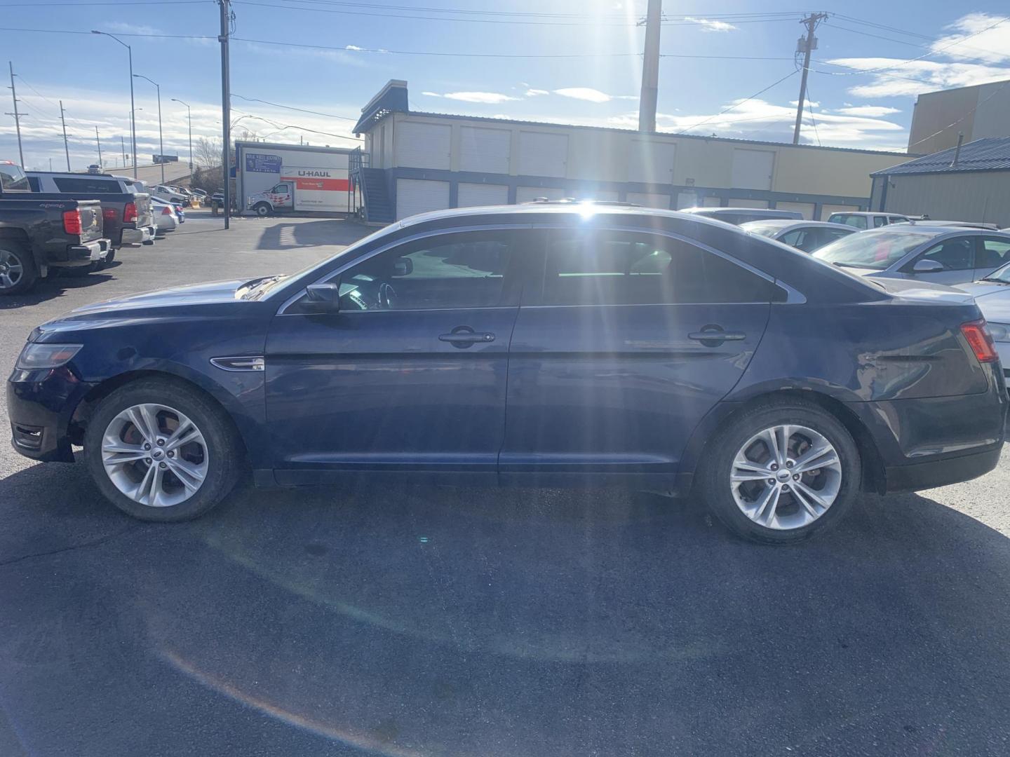 2016 Blue Ford Taurus SEL FWD (1FAHP2E87GG) with an 3.5L V6 DOHC 24V engine, 6A transmission, located at 2015 Cambell Street, Rapid City, SD, 57701, (605) 342-8326, 44.066433, -103.191772 - FRESH TRADE ALERT!!!!! - Photo#1