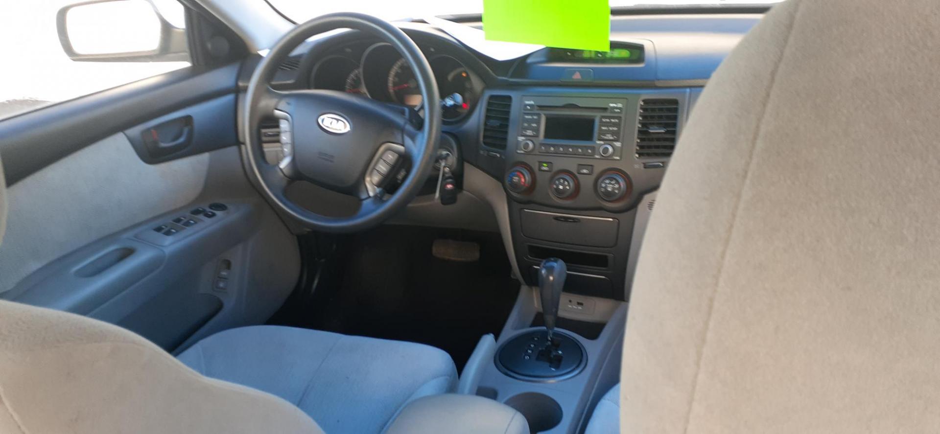 2009 Kia Optima EX (KNAGE228995) with an 2.4L L4 DOHC 16V engine, 4-Speed Automatic transmission, located at 2015 Cambell Street, Rapid City, SD, 57701, (605) 342-8326, 44.066433, -103.191772 - CARFAX AVAILABLE - Photo#6