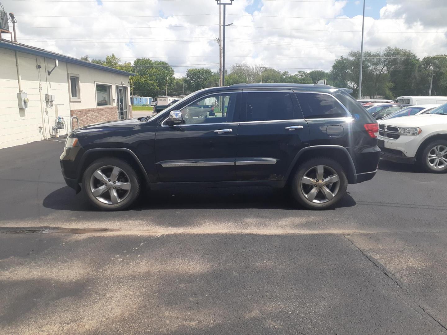 2012 Jeep Grand Cherokee Overland 4WD (1C4RJFCG6CC) with an 3.6L V6 DOHC 24V engine, 5-Speed Automatic transmission, located at 2015 Cambell Street, Rapid City, SD, 57701, (605) 342-8326, 44.066433, -103.191772 - CARFAX AVAILABLE NO FINANCING AVAILABLE CASH SALE ONLY VEHICLE - Photo#0