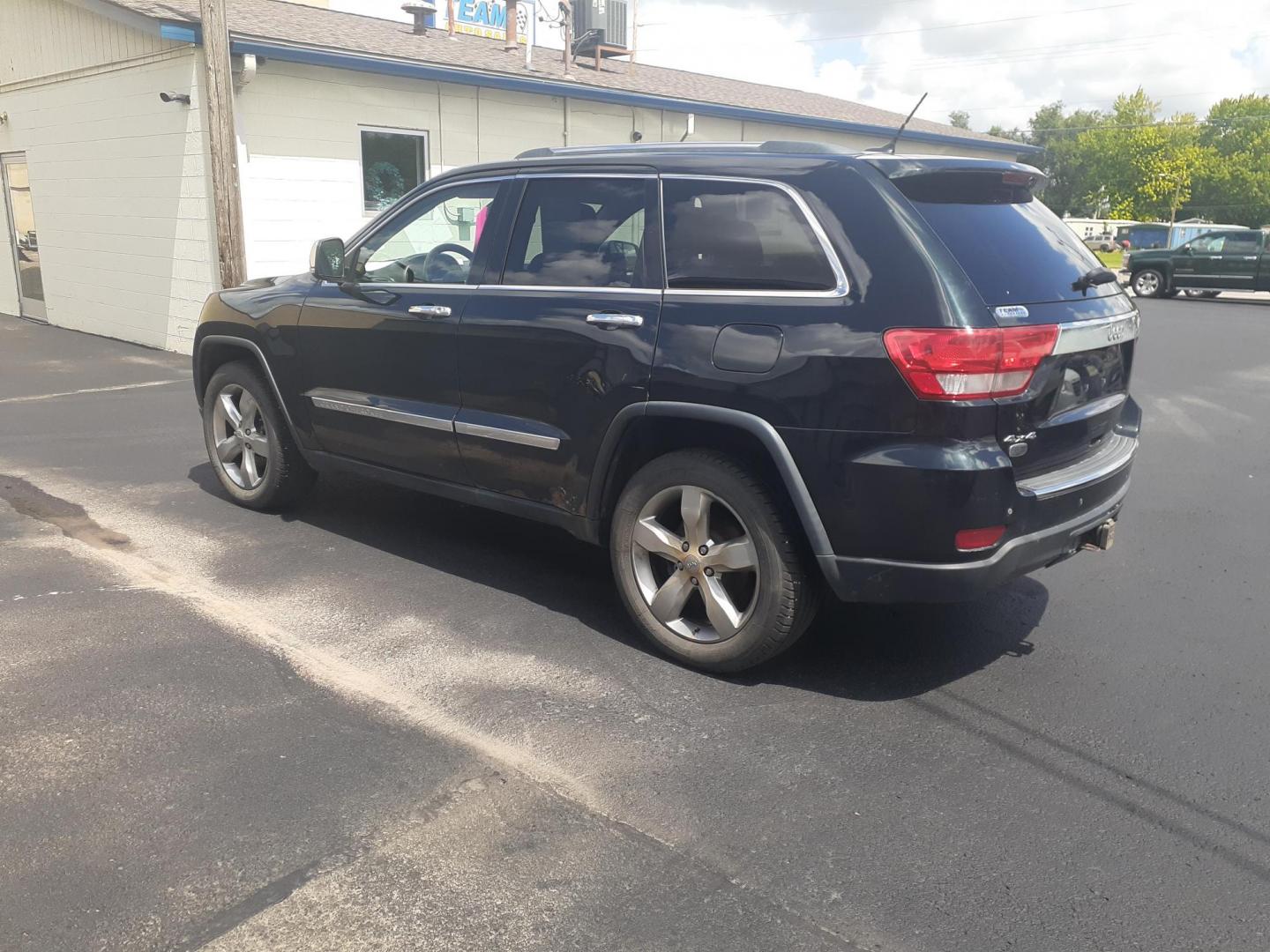 2012 Jeep Grand Cherokee Overland 4WD (1C4RJFCG6CC) with an 3.6L V6 DOHC 24V engine, 5-Speed Automatic transmission, located at 2015 Cambell Street, Rapid City, SD, 57701, (605) 342-8326, 44.066433, -103.191772 - CARFAX AVAILABLE NO FINANCING AVAILABLE CASH SALE ONLY VEHICLE - Photo#2