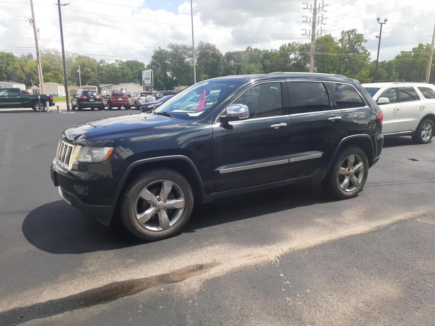 2012 Jeep Grand Cherokee Overland 4WD (1C4RJFCG6CC) with an 3.6L V6 DOHC 24V engine, 5-Speed Automatic transmission, located at 2015 Cambell Street, Rapid City, SD, 57701, (605) 342-8326, 44.066433, -103.191772 - CARFAX AVAILABLE NO FINANCING AVAILABLE CASH SALE ONLY VEHICLE - Photo#1