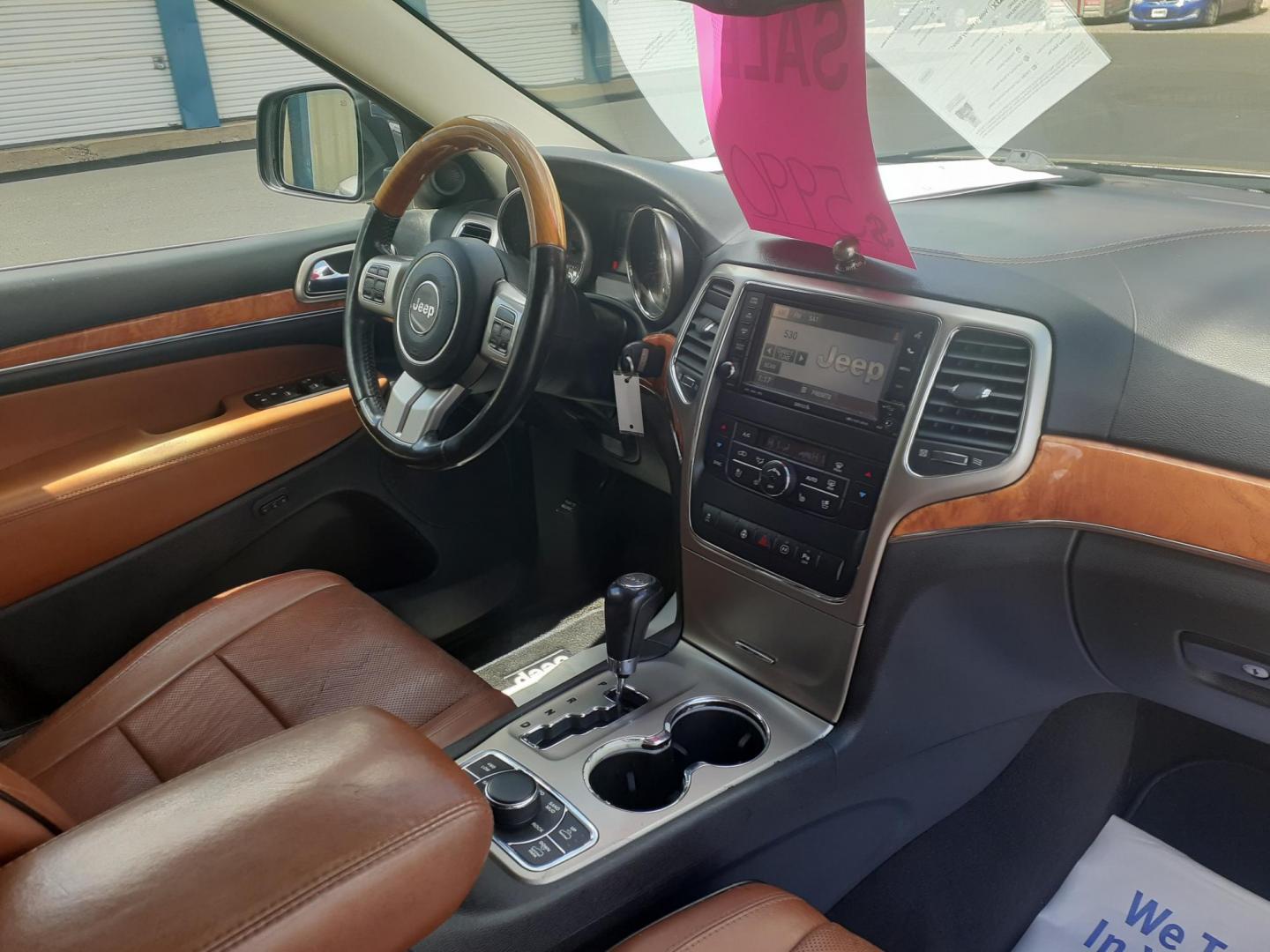 2012 Jeep Grand Cherokee Overland 4WD (1C4RJFCG6CC) with an 3.6L V6 DOHC 24V engine, 5-Speed Automatic transmission, located at 2015 Cambell Street, Rapid City, SD, 57701, (605) 342-8326, 44.066433, -103.191772 - CARFAX AVAILABLE NO FINANCING AVAILABLE CASH SALE ONLY VEHICLE - Photo#7