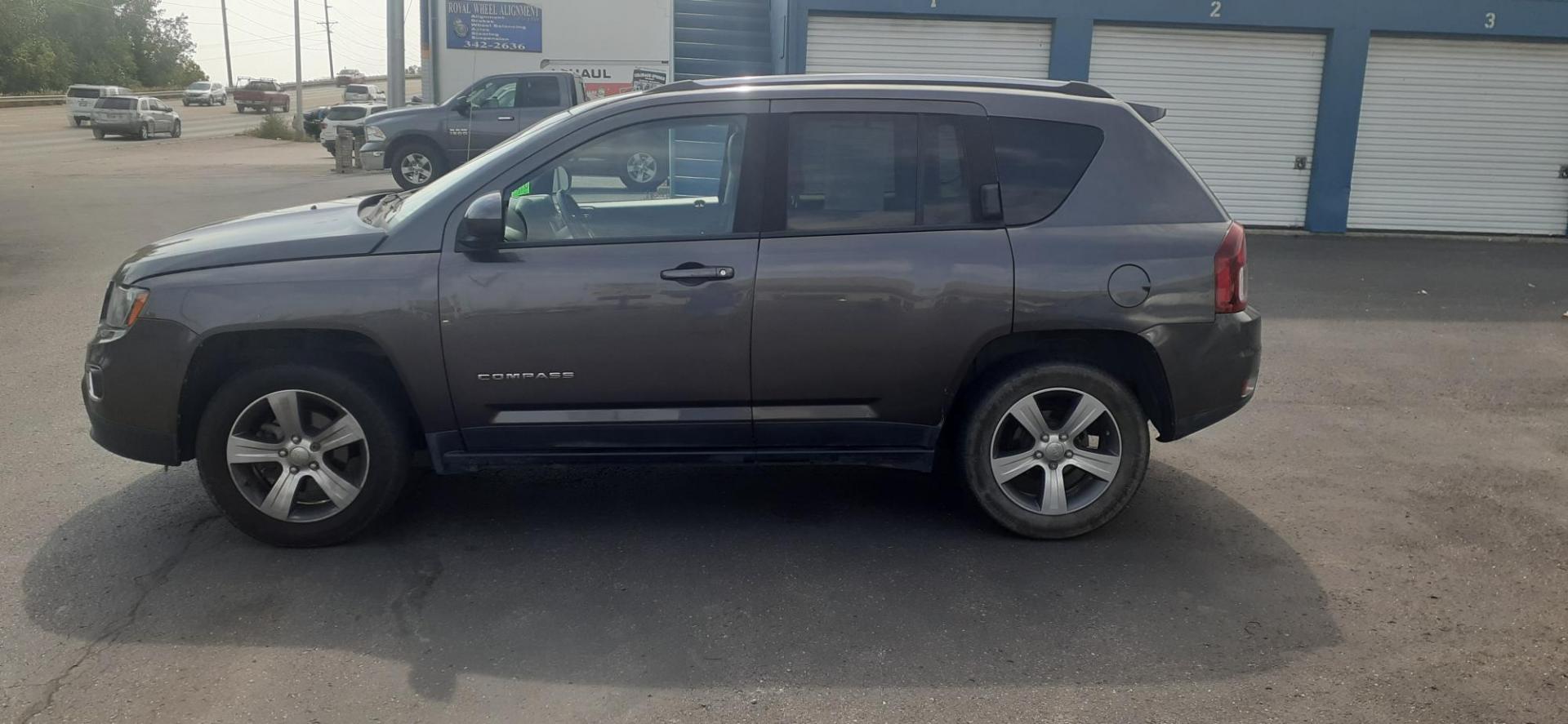 2016 Jeep Compass Latitude 4WD (1C4NJDEB4GD) with an 2.4L L4 DOHC 16V engine, 6A transmission, located at 2015 Cambell Street, Rapid City, SD, 57701, (605) 342-8326, 44.066433, -103.191772 - CARFAX AVAILABLE - Photo#0