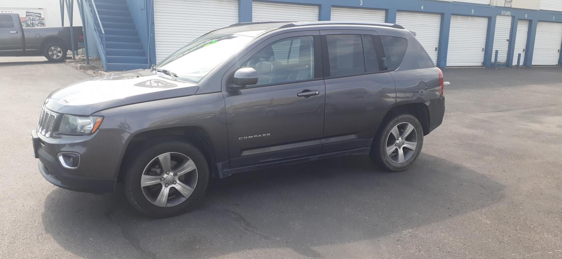 2016 Jeep Compass Latitude 4WD (1C4NJDEB4GD) with an 2.4L L4 DOHC 16V engine, 6A transmission, located at 2015 Cambell Street, Rapid City, SD, 57701, (605) 342-8326, 44.066433, -103.191772 - CARFAX AVAILABLE - Photo#1