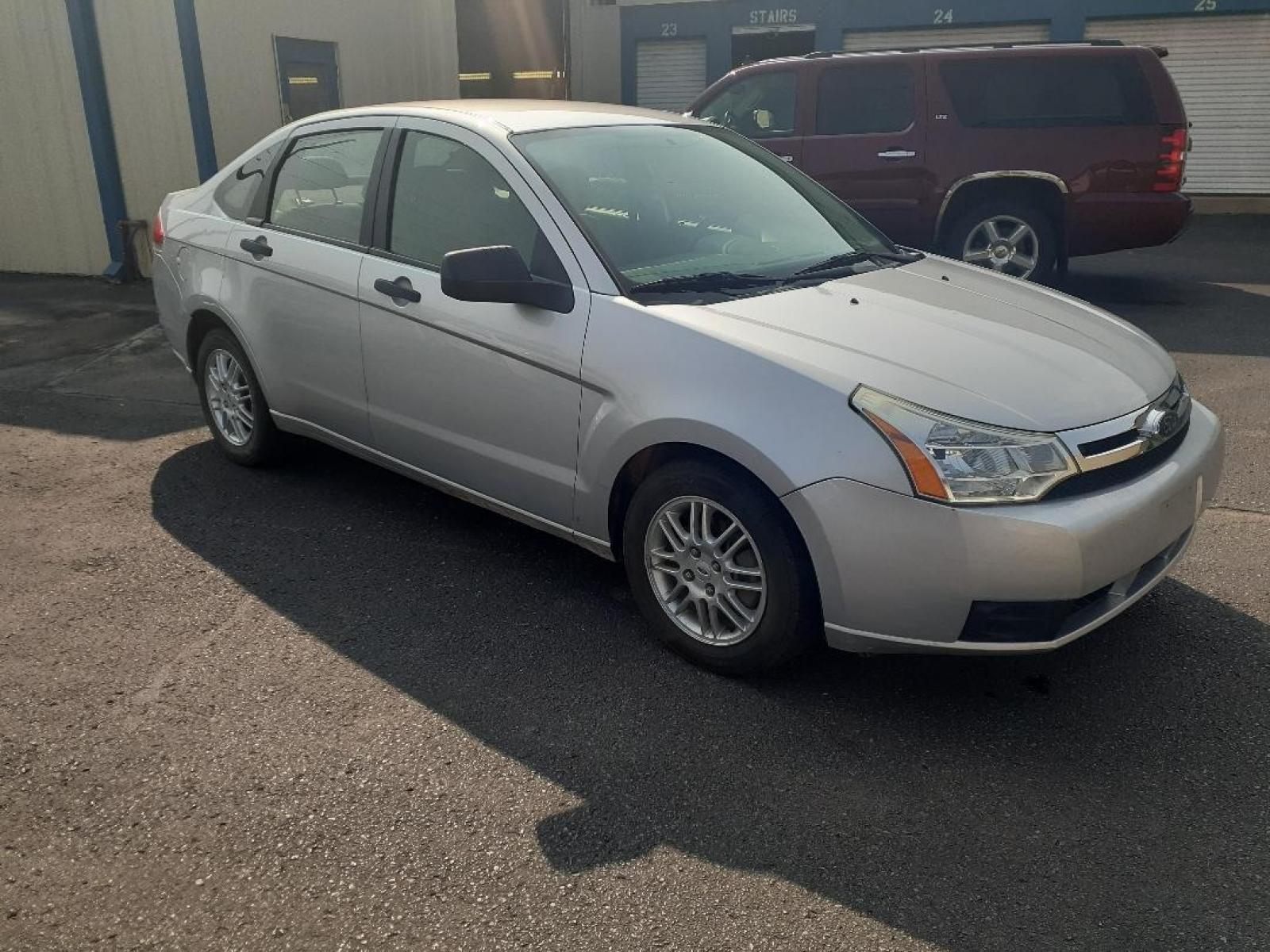 2010 Ford Focus SE Sedan (1FAHP3FN2AW) with an 2.0L L4 DOHC 16V engine, located at 2015 Cambell Street, Rapid City, SD, 57701, (605) 342-8326, 44.066433, -103.191772 - CARFAX AVAILABLE - Photo #4