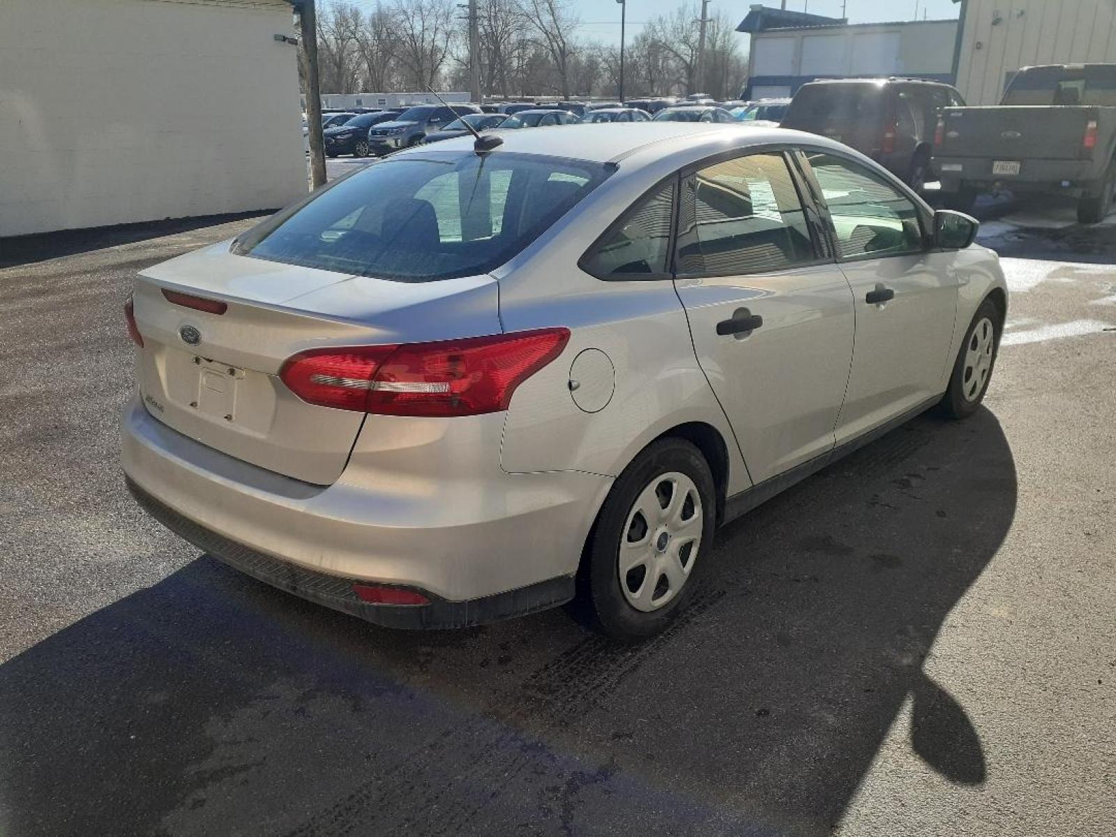 2017 Ford Focus S Sedan (1FADP3E25HL) with an 2.0L L4 DOHC 16V engine, 5M transmission, located at 2015 Cambell Street, Rapid City, SD, 57701, (605) 342-8326, 44.066433, -103.191772 - CARFAX AVAILABLE - Photo #2