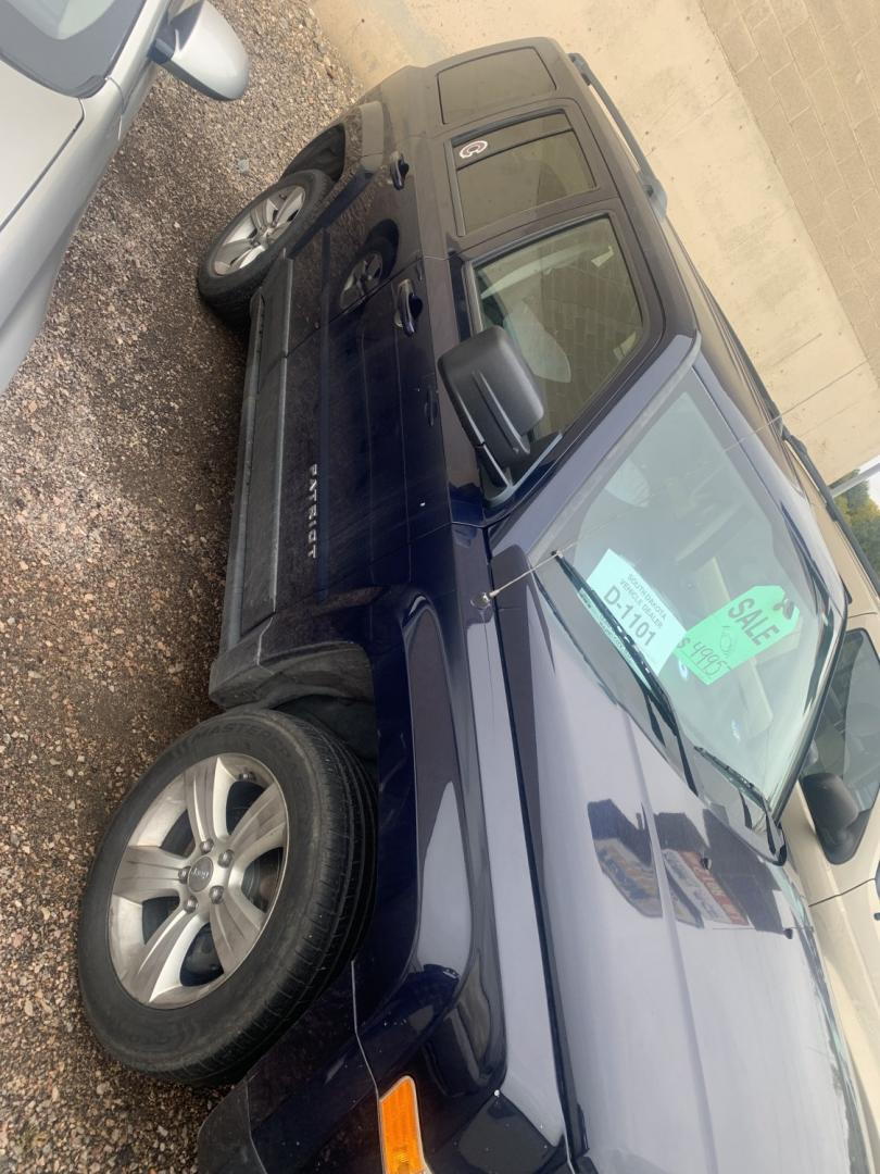 2013 Jeep Patriot Latitude 4WD (1C4NJRFBXDD) with an 2.4L L4 DOHC 16V engine, located at 2015 Cambell Street, Rapid City, SD, 57701, (605) 342-8326, 44.066433, -103.191772 - FRESH TRADE CARFAX AVAILABLE- Photo#1