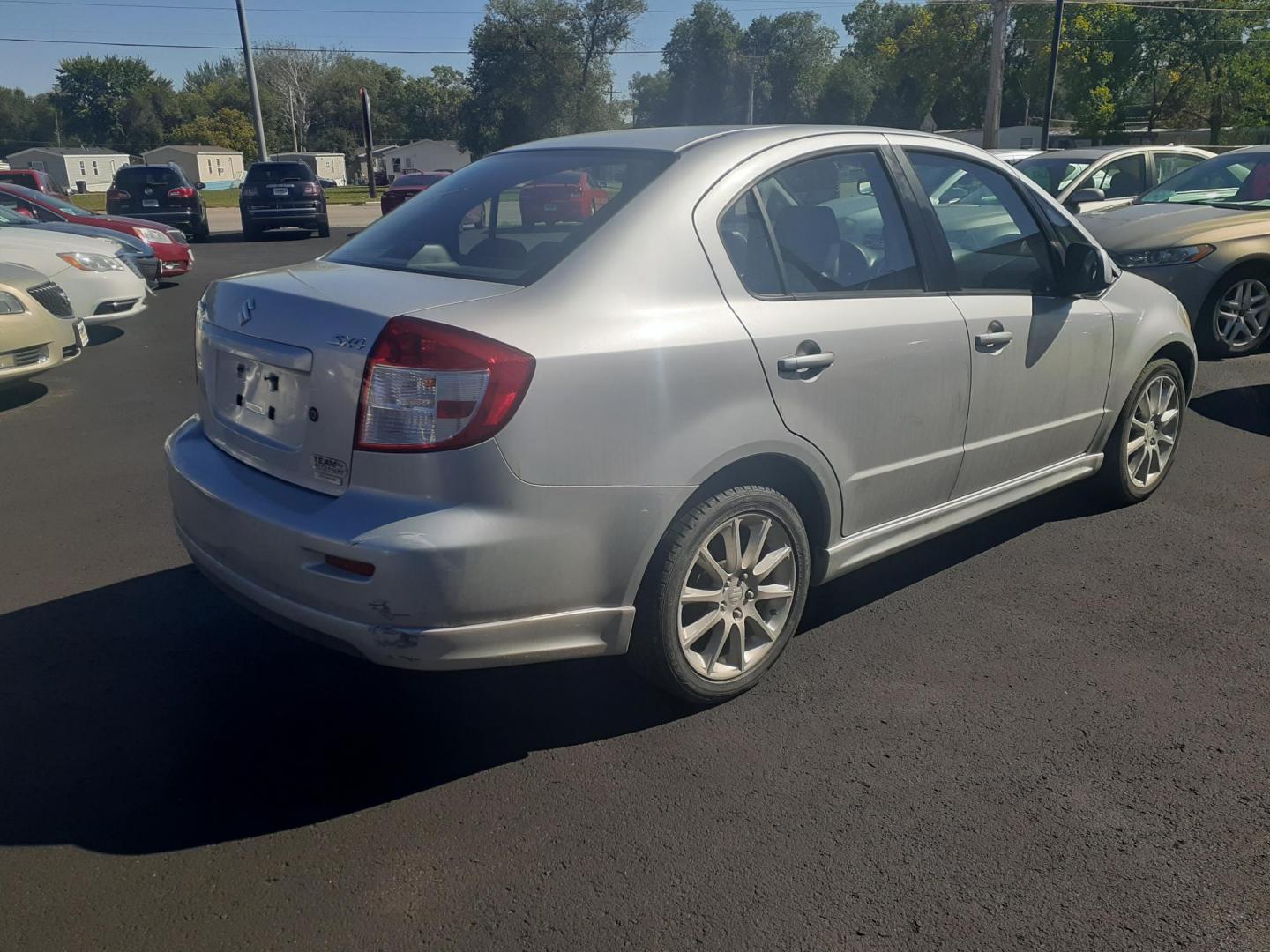 2009 Suzuki SX4 Sport Base (JS2YC414696) with an 2.0L L4 DOHC 16V engine, located at 2015 Cambell Street, Rapid City, SD, 57701, (605) 342-8326, 44.066433, -103.191772 - CARFAX AVAILABLE - Photo#3