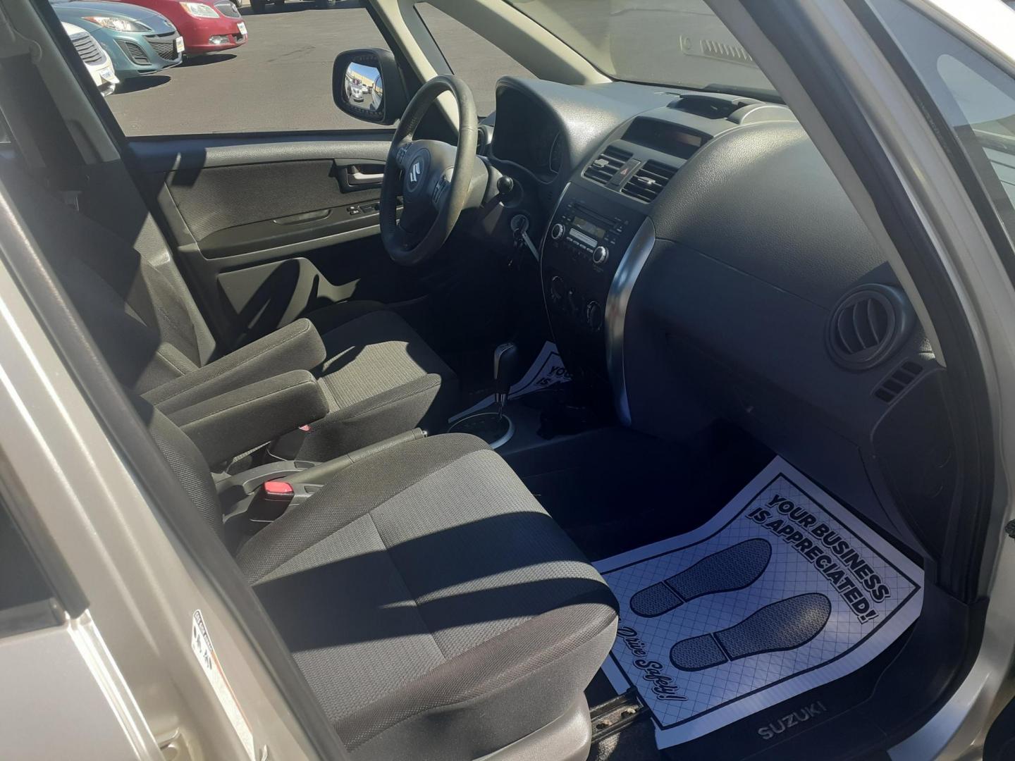 2009 Suzuki SX4 Sport Base (JS2YC414696) with an 2.0L L4 DOHC 16V engine, located at 2015 Cambell Street, Rapid City, SD, 57701, (605) 342-8326, 44.066433, -103.191772 - CARFAX AVAILABLE - Photo#5