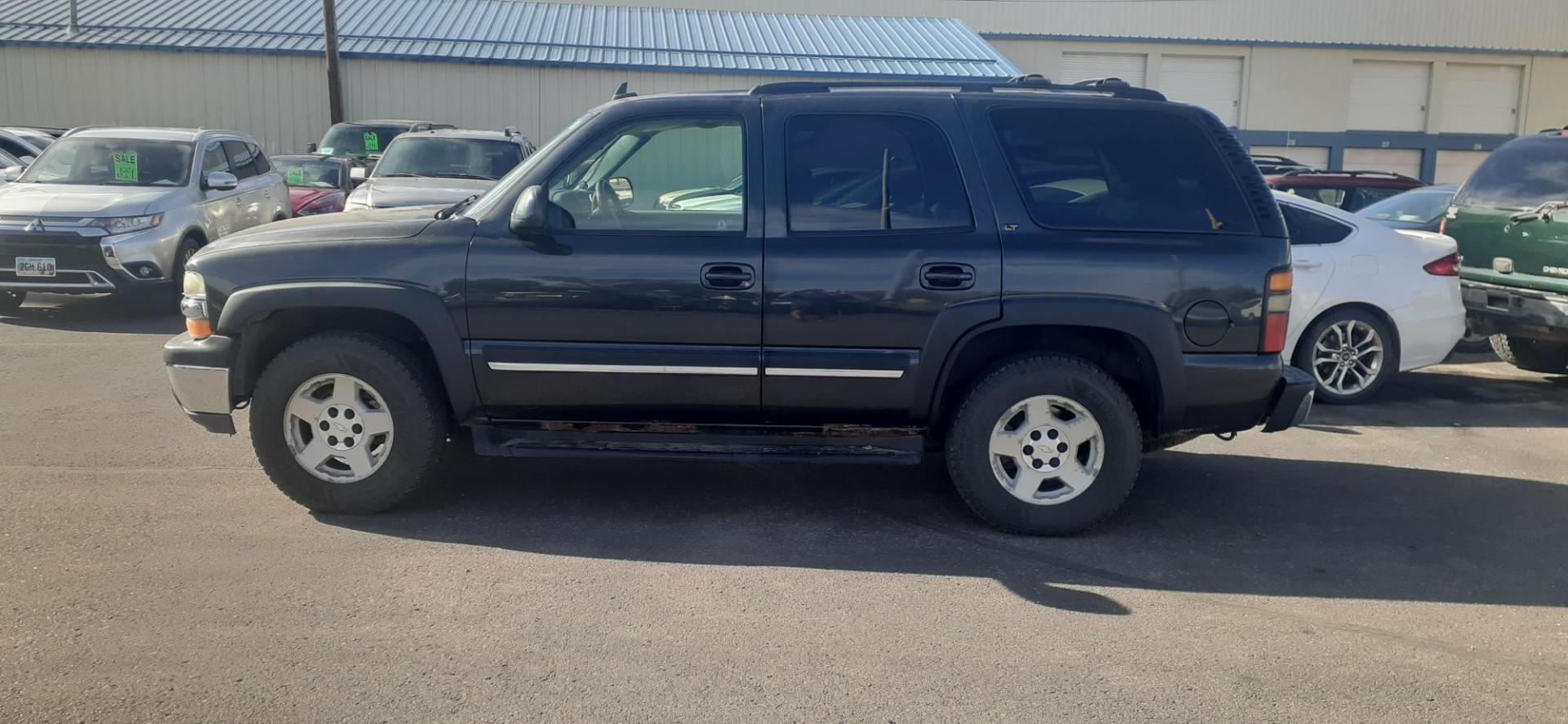 2006 Chevrolet Tahoe 4WD (1GNEK13Z66J) with an 5.3L V8 OHV 16V FFV engine, 4-Speed Automatic Overdrive transmission, located at 2015 Cambell Street, Rapid City, SD, 57701, (605) 342-8326, 44.066433, -103.191772 - CARFAX AVAILABLE - Photo#0