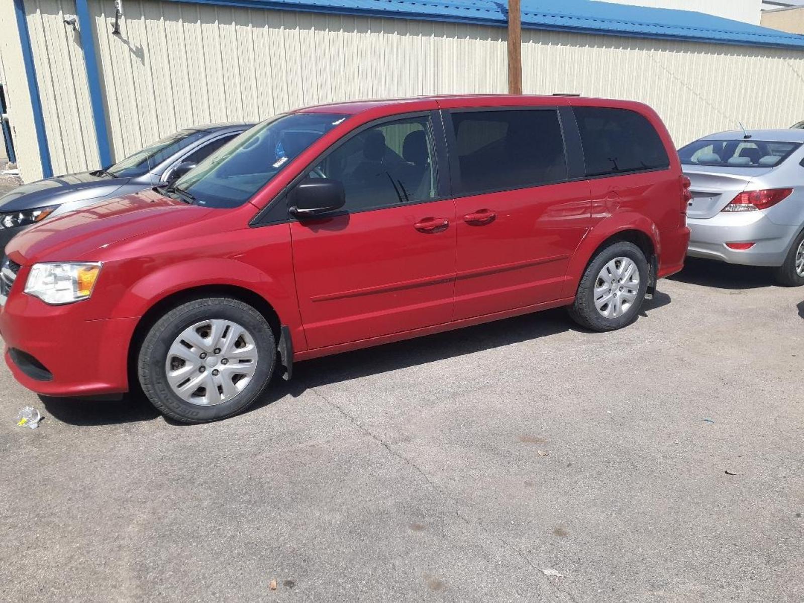 2015 Dodge Grand Caravan SE (2C4RDGBG9FR) with an 3.6L V6 DOHC 24V engine, 6-Speed Automatic transmission, located at 2015 Cambell Street, Rapid City, SD, 57701, (605) 342-8326, 44.066433, -103.191772 - CARFAX AVAILALBE - Photo #1