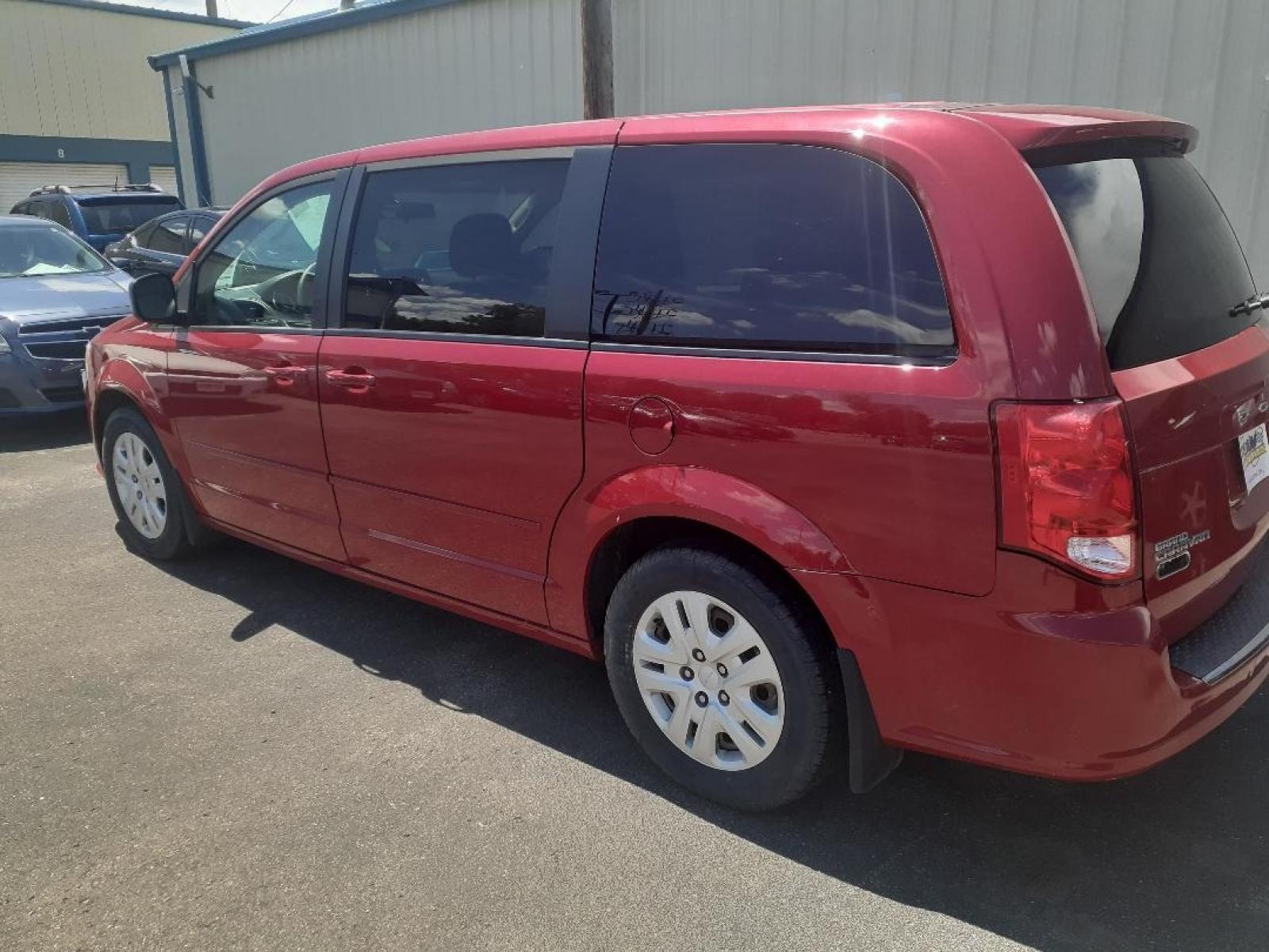 2015 Dodge Grand Caravan SE (2C4RDGBG9FR) with an 3.6L V6 DOHC 24V engine, 6-Speed Automatic transmission, located at 2015 Cambell Street, Rapid City, SD, 57701, (605) 342-8326, 44.066433, -103.191772 - Photo #4