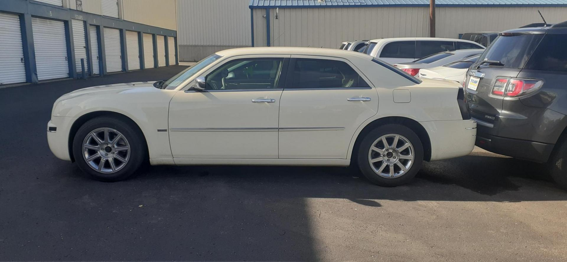 2010 Chrysler 300 Touring (2C3CA5CV1AH) with an 3.5L V6 SOHC 24V engine, 4-Speed Automatic transmission, located at 2015 Cambell Street, Rapid City, SD, 57701, (605) 342-8326, 44.066433, -103.191772 - CARFAX AVAILABLE - Photo#0