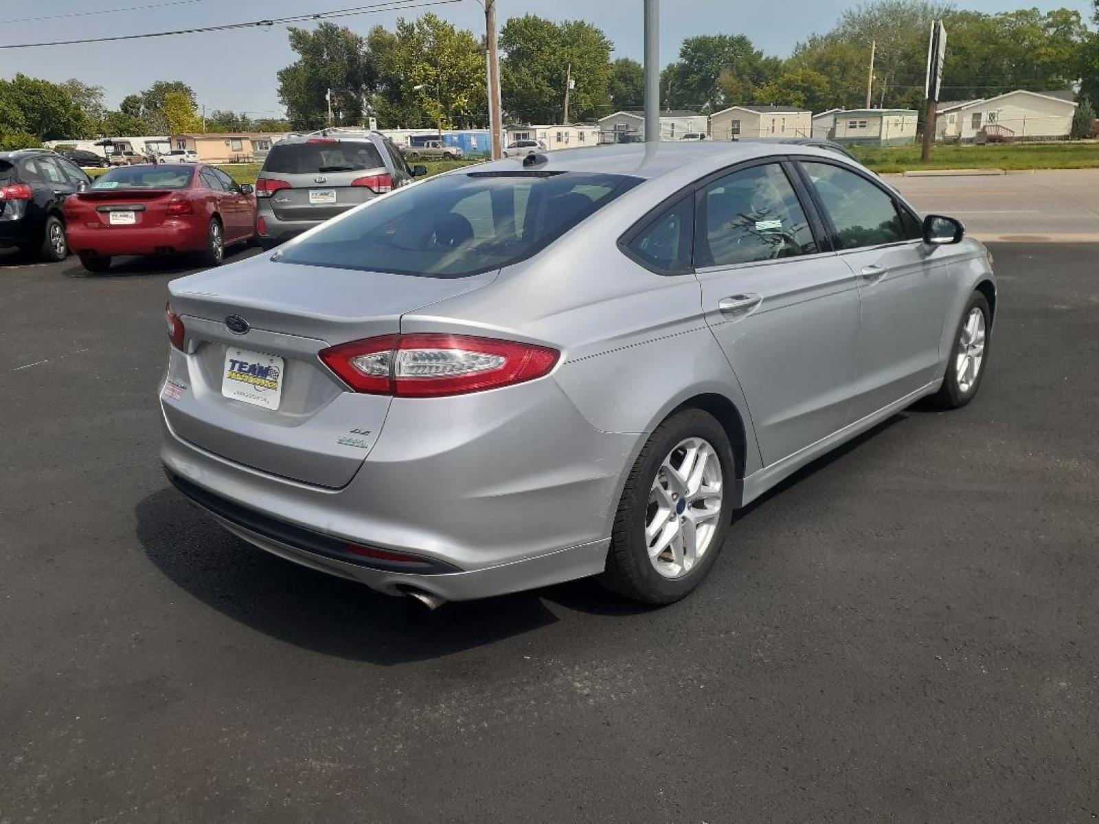 2013 Ford Fusion SE (3FA6P0HR8DR) with an 1.6L L4 DOHC 16V engine, located at 2015 Cambell Street, Rapid City, SD, 57701, (605) 342-8326, 44.066433, -103.191772 - CARFAX AVAILABLE - Photo #3