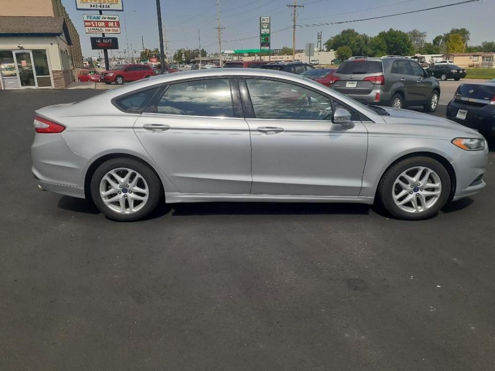 2013 Ford Fusion SE (3FA6P0HR8DR) with an 1.6L L4 DOHC 16V engine, located at 2015 Cambell Street, Rapid City, SD, 57701, (605) 342-8326, 44.066433, -103.191772 - CARFAX AVAILABLE - Photo #4