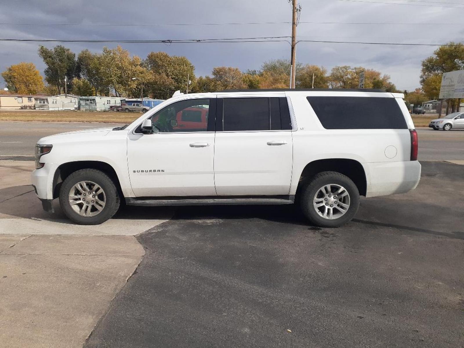 2019 Chevrolet Suburban LT 4WD (1GNSKHKC4KR) with an 5.3L V8 OHV 16V engine, 6A transmission, located at 2015 Cambell Street, Rapid City, SD, 57701, (605) 342-8326, 44.066433, -103.191772 - CARFAX AVAILABLE - Photo #0