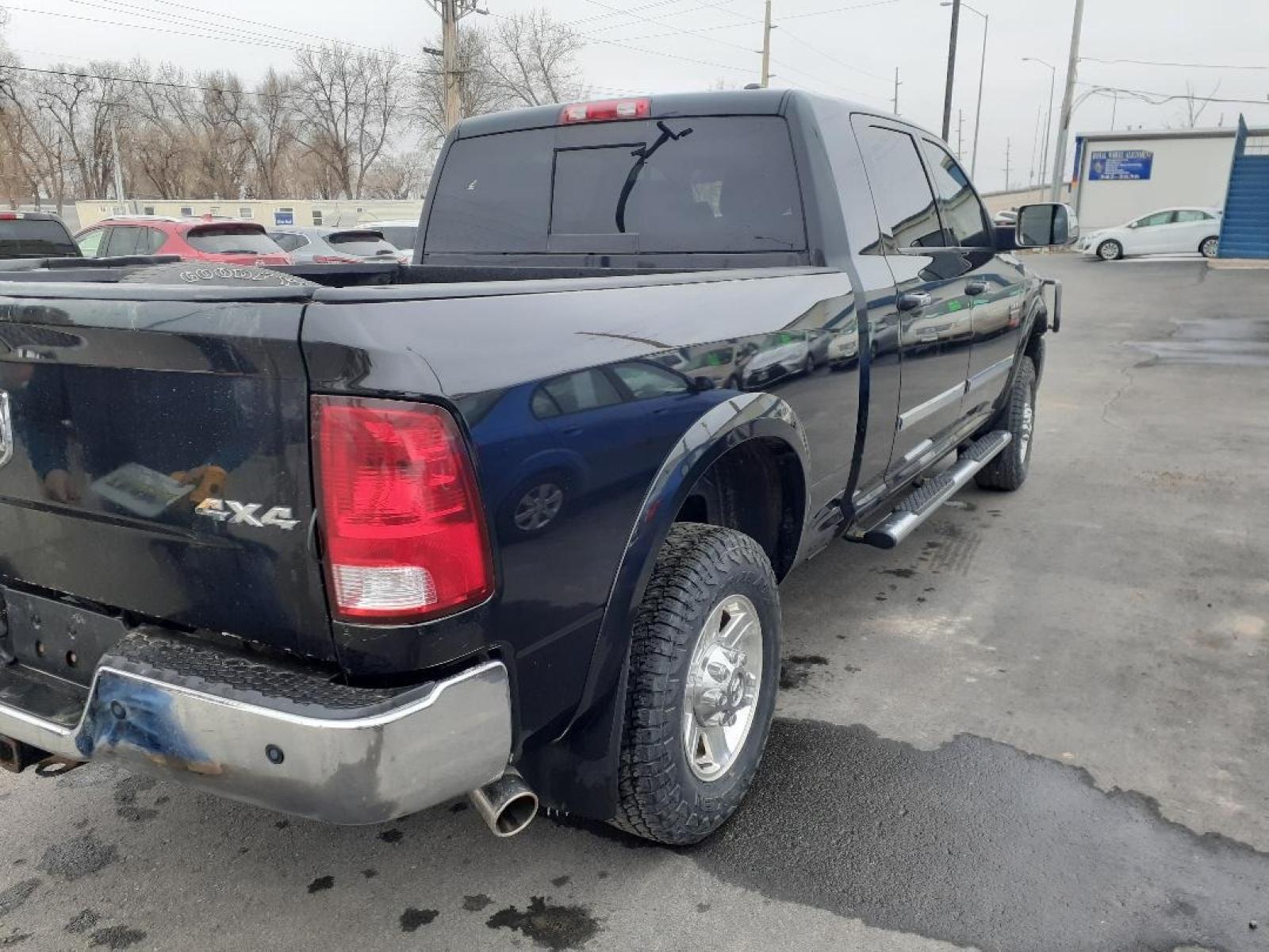 2011 Dodge Ram 2500 SLT Mega Cab 4WD (3D7TT2HT5BG) with an 5.7L V8 OHV 16V engine, located at 2015 Cambell Street, Rapid City, SD, 57701, (605) 342-8326, 44.066433, -103.191772 - CARFAX AVAILABLE - Photo #4