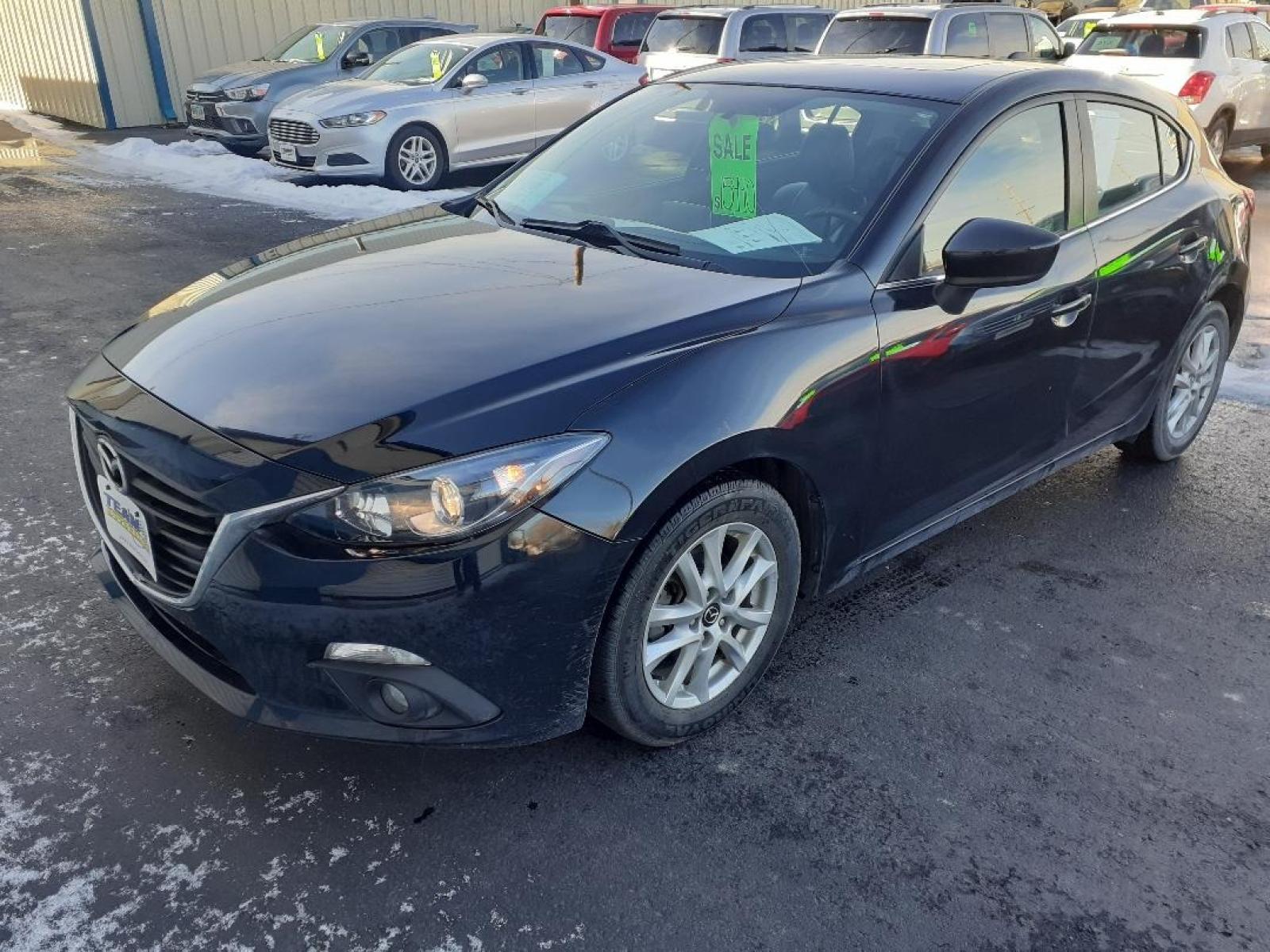 2015 Mazda MAZDA3 i Grand Touring AT 5-Door (JM1BM1M71F1) with an 2.0L L4 DOHC 16V engine, 6-Speed Automatic transmission, located at 2015 Cambell Street, Rapid City, SD, 57701, (605) 342-8326, 44.066433, -103.191772 - CARFAX AVAILABLE - Photo #1