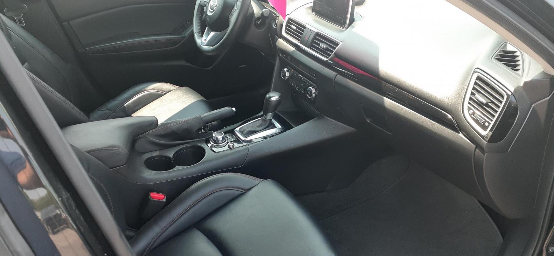 2015 Mazda MAZDA3 i Grand Touring AT 5-Door (JM1BM1M71F1) with an 2.0L L4 DOHC 16V engine, 6-Speed Automatic transmission, located at 2015 Cambell Street, Rapid City, SD, 57701, (605) 342-8326, 44.066433, -103.191772 - CARFAX AVAILABLE - Photo#2