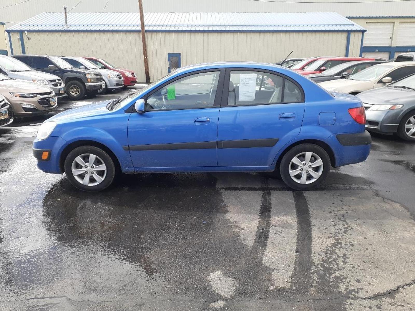 2009 Kia Rio Base (KNADE223796) with an 1.6 L 4 CYLINDER engine, Automatic transmission, located at 2015 Cambell Street, Rapid City, SD, 57701, (605) 342-8326, 44.066433, -103.191772 - CARFAX - Photo #0