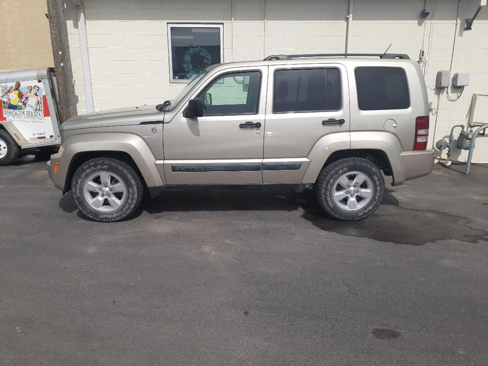 2010 Jeep Liberty Sport 4WD (1J4PN2GK4AW) with an 3.7L V6 SOHC 12V engine, 4-Speed Automatic transmission, located at 2015 Cambell Street, Rapid City, SD, 57701, (605) 342-8326, 44.066433, -103.191772 - CARFAX AVAILALBE - Photo #0