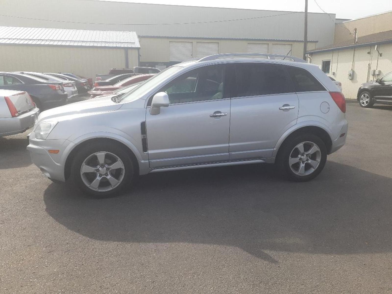 2013 Chevrolet Captiva Sport LTZ FWD (3GNAL4EK4DS) with an 2.4L L4 DOHC 16V FFV engine, 6-Speed Automatic transmission, located at 2015 Cambell Street, Rapid City, SD, 57701, (605) 342-8326, 44.066433, -103.191772 - CARFAX AVAILABLE - Photo #0