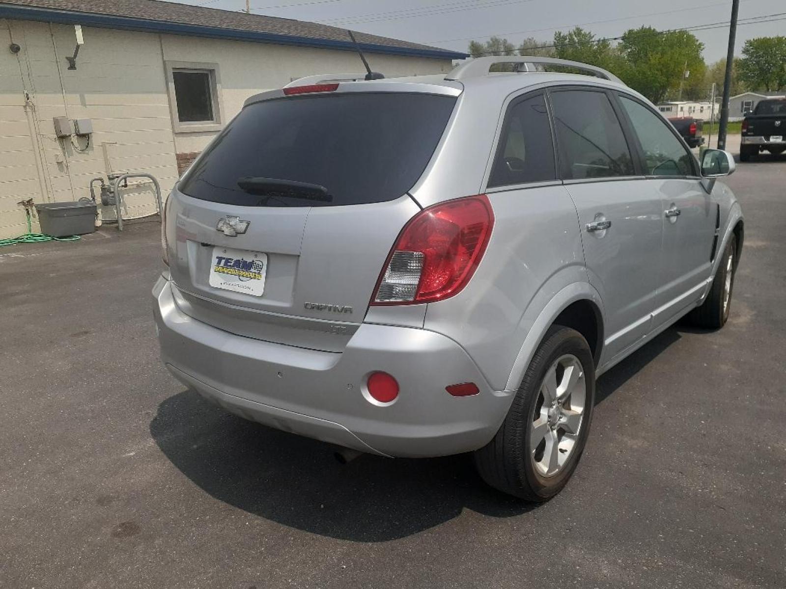 2013 Chevrolet Captiva Sport LTZ FWD (3GNAL4EK4DS) with an 2.4L L4 DOHC 16V FFV engine, 6-Speed Automatic transmission, located at 2015 Cambell Street, Rapid City, SD, 57701, (605) 342-8326, 44.066433, -103.191772 - CARFAX AVAILABLE - Photo #6