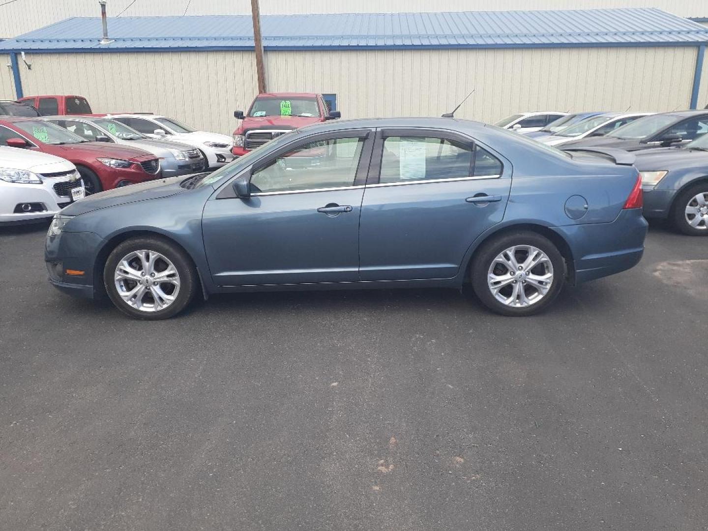 2012 Ford Fusion SE (3FAHP0HA1CR) with an 2.5L L4 DOHC 16V engine, located at 2015 Cambell Street, Rapid City, SD, 57701, (605) 342-8326, 44.066433, -103.191772 - CARFAX AVAILABLE - Photo#0