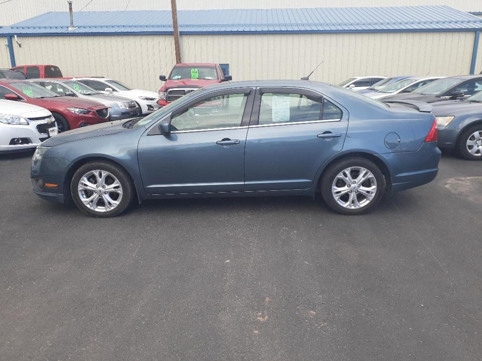 2012 Ford Fusion SE (3FAHP0HA1CR) with an 2.5L L4 DOHC 16V engine, located at 2015 Cambell Street, Rapid City, SD, 57701, (605) 342-8326, 44.066433, -103.191772 - Photo #0