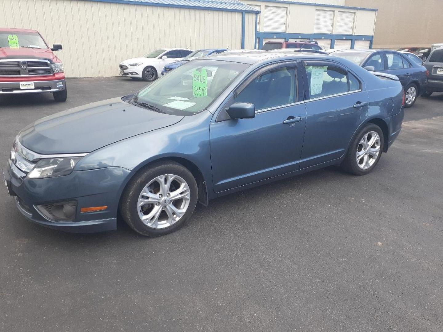 2012 Ford Fusion SE (3FAHP0HA1CR) with an 2.5L L4 DOHC 16V engine, located at 2015 Cambell Street, Rapid City, SD, 57701, (605) 342-8326, 44.066433, -103.191772 - CARFAX AVAILABLE - Photo#1