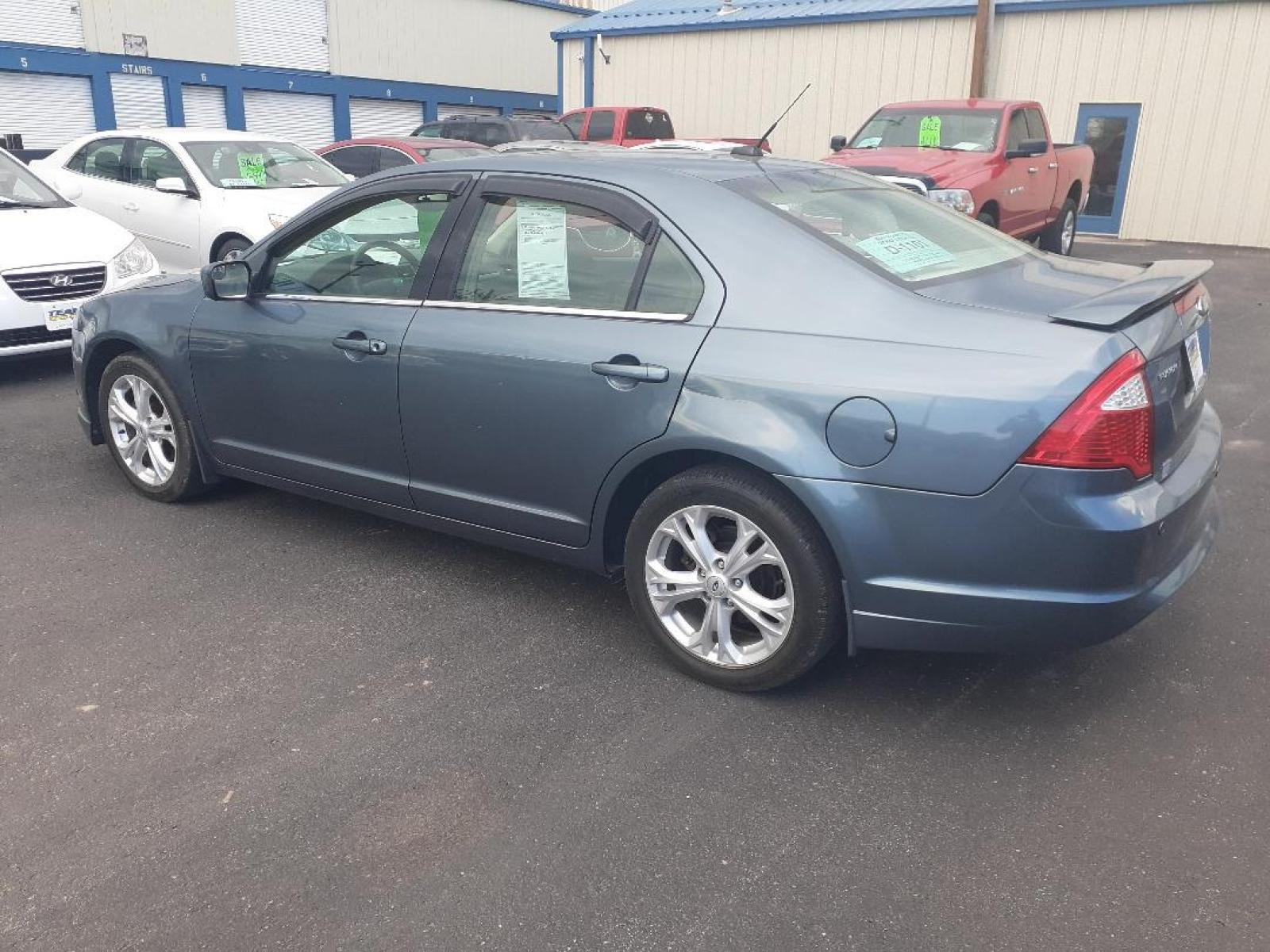 2012 Ford Fusion SE (3FAHP0HA1CR) with an 2.5L L4 DOHC 16V engine, located at 2015 Cambell Street, Rapid City, SD, 57701, (605) 342-8326, 44.066433, -103.191772 - Photo #2