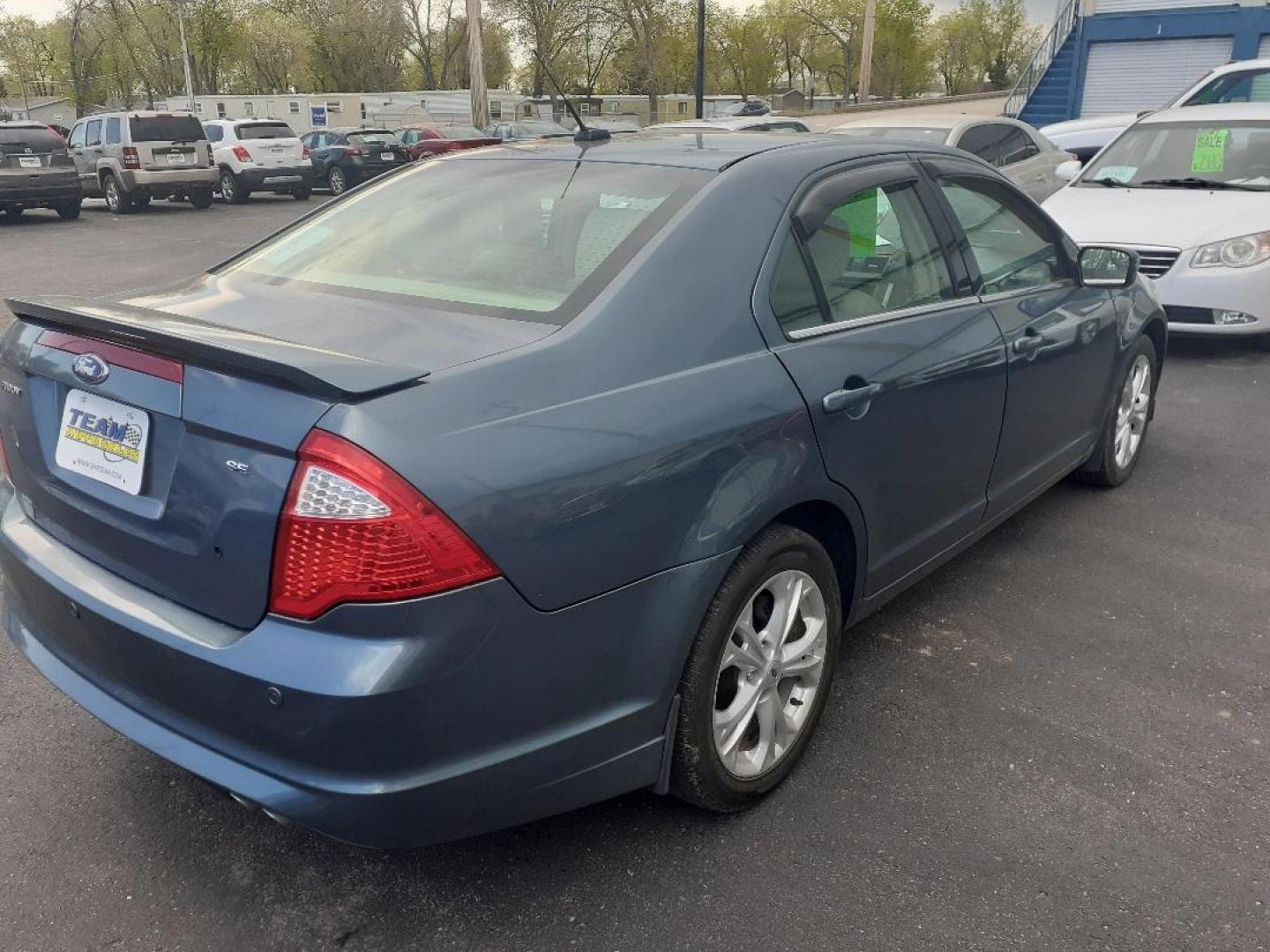 2012 Ford Fusion SE (3FAHP0HA1CR) with an 2.5L L4 DOHC 16V engine, located at 2015 Cambell Street, Rapid City, SD, 57701, (605) 342-8326, 44.066433, -103.191772 - CARFAX AVAILABLE - Photo#3